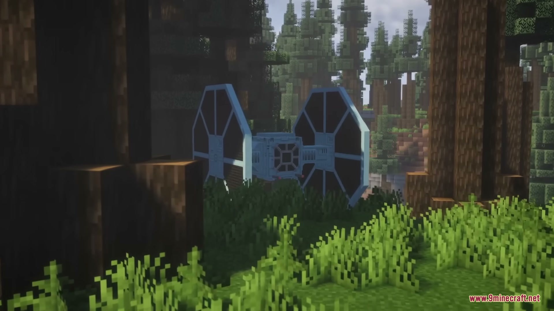 Star Wars Expansion Mod (1.20.1) – Fly Starships And Travel To Alien Planets 15 A tie fighter parked between tall trees in a dense forest biome