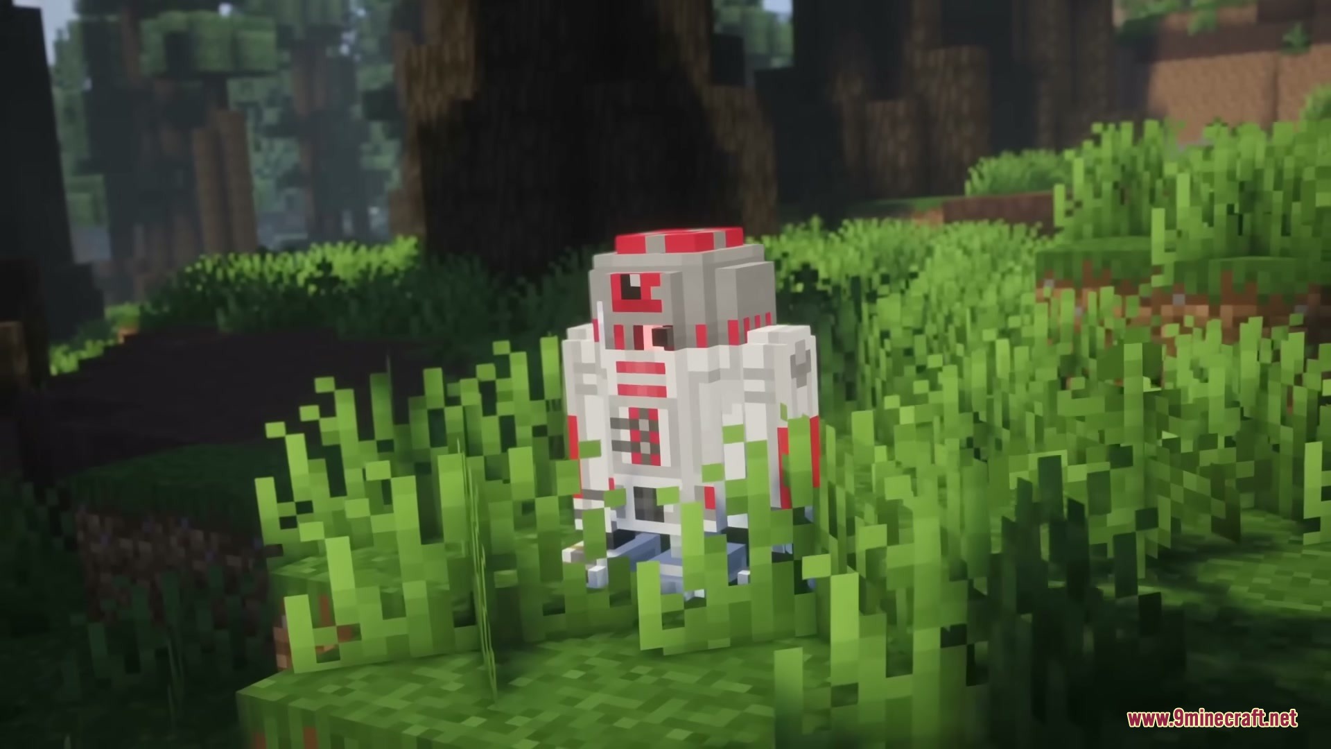 Star Wars Expansion Mod (1.20.1) – Fly Starships And Travel To Alien Planets 19 A small red and white astromech droid stands in the tall green grass