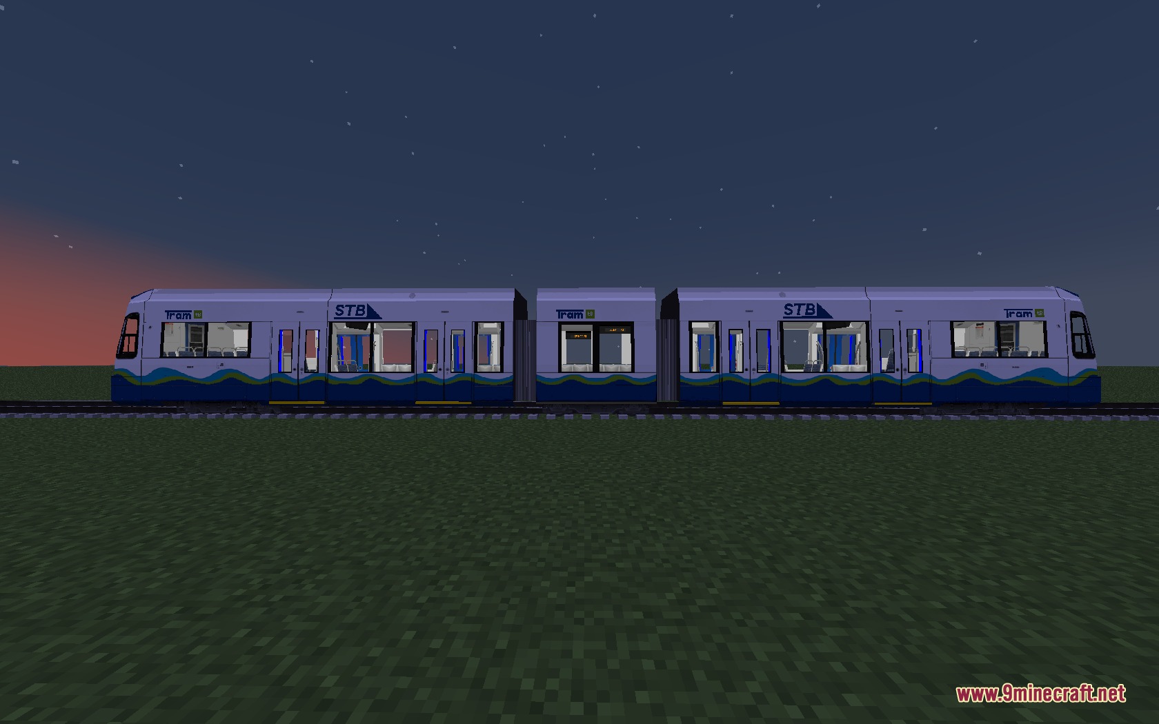 Steel Transit Blueprints Resource Pack (1.20.1) – Sleek Modern Trains 4 A blue and white stb tram parked on tracks in a minecraft world