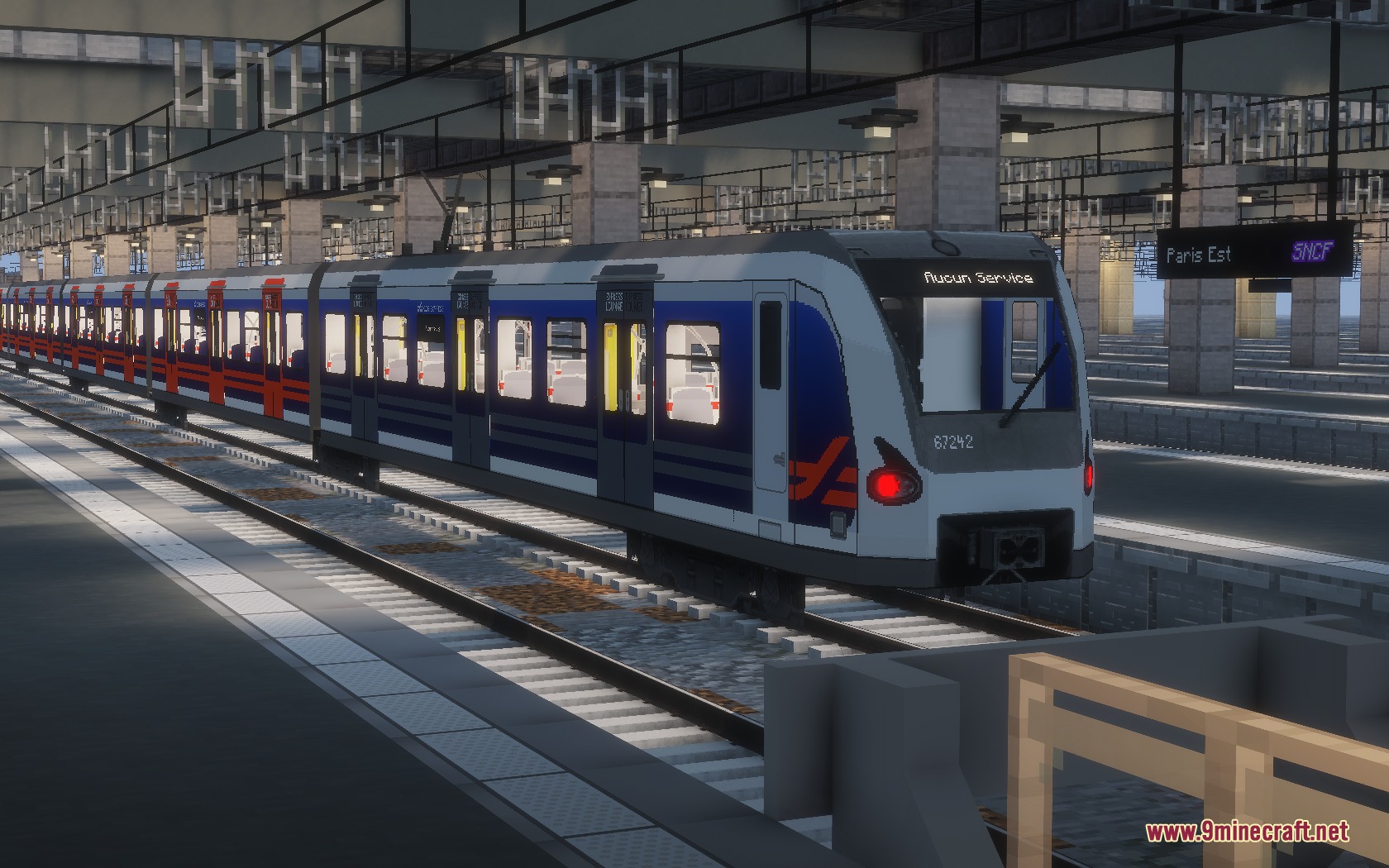 Steel Transit Blueprints Resource Pack (1.20.1) – Sleek Modern Trains 5 A blue and white sncf train stopped at a detailed minecraft station platform