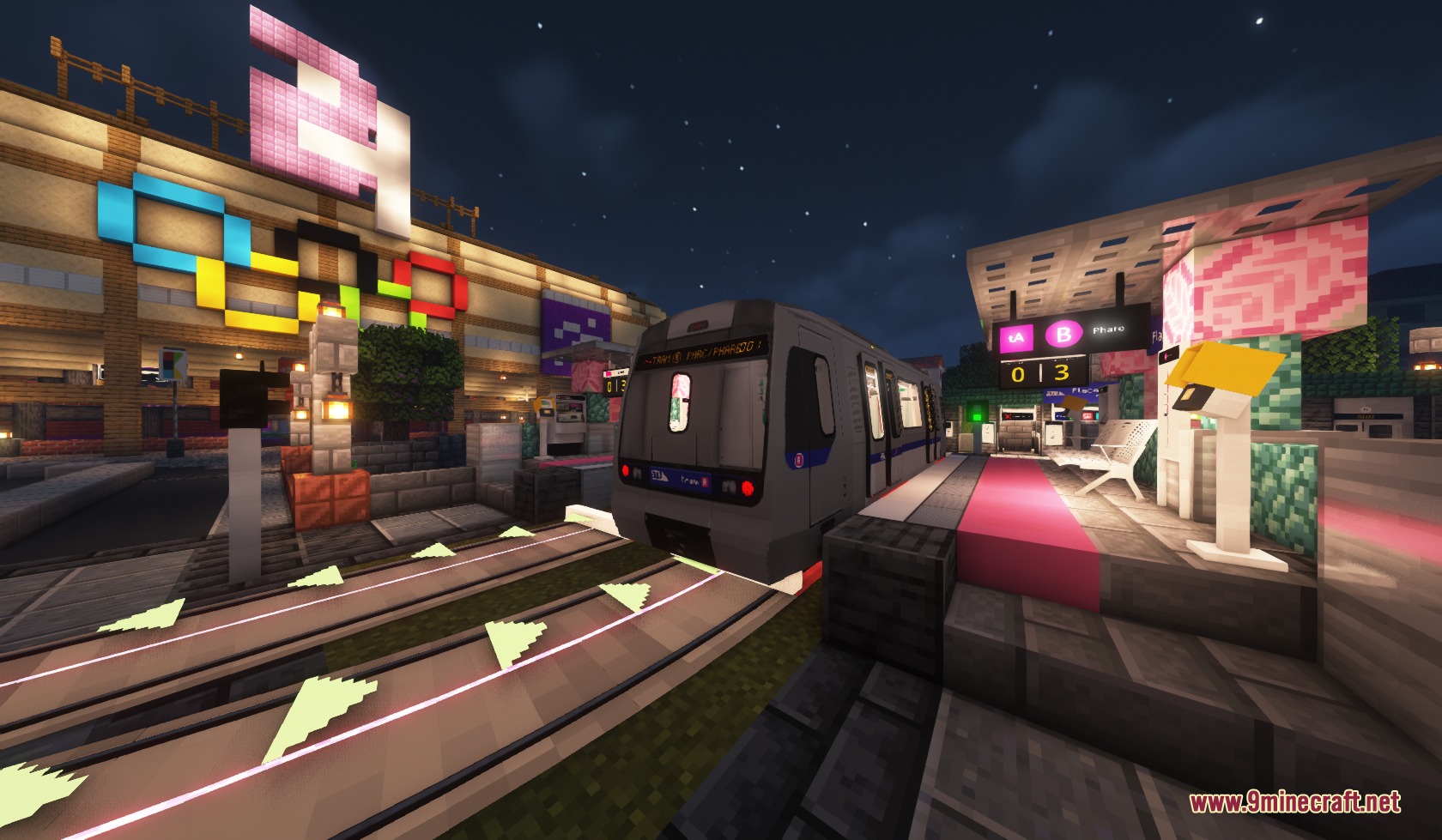 Steel Transit Blueprints Resource Pack (1.20.1) – Sleek Modern Trains 9 A modern train arrives at a brightly lit outdoor station at night