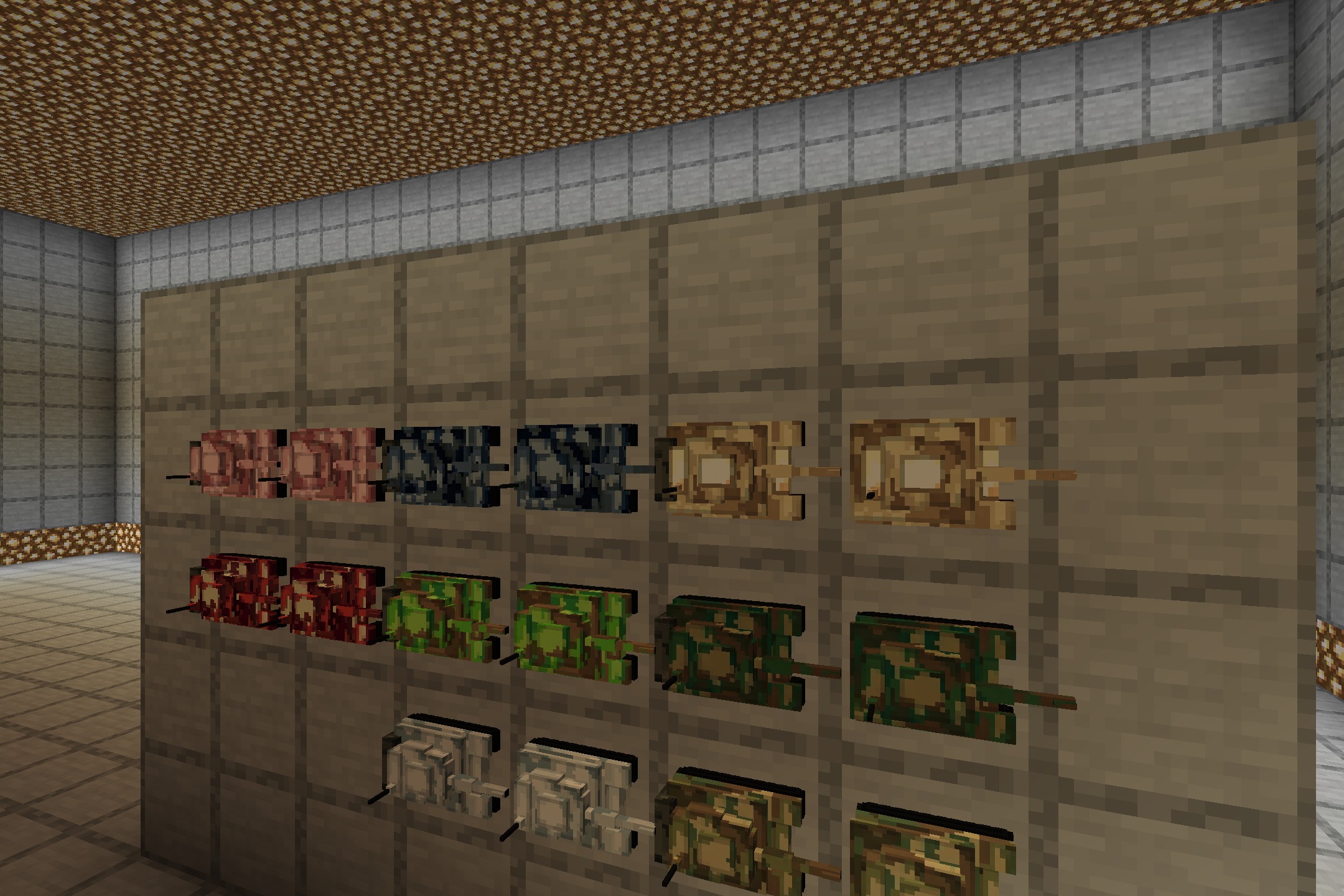 A display of various miniature tank models mounted on a wooden wall