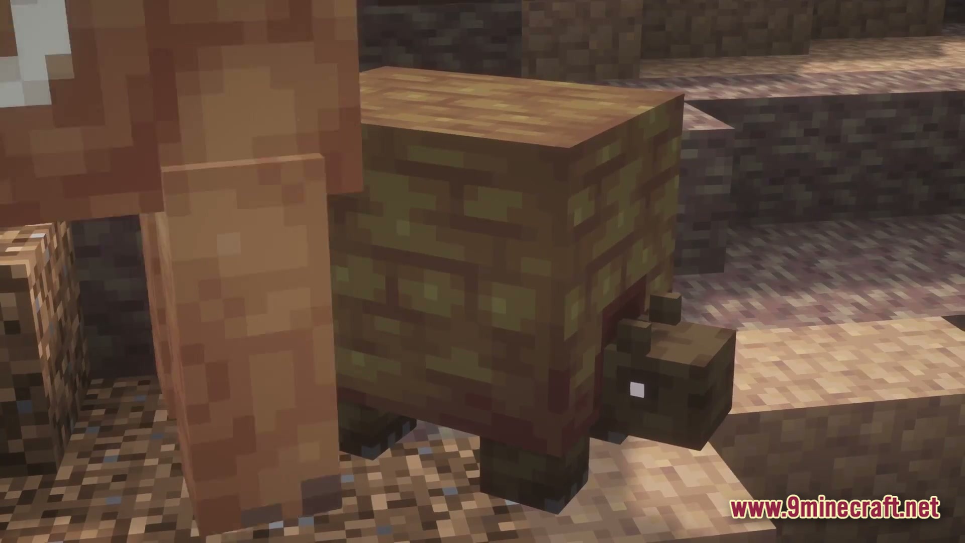 The Ancient Dawn Prehistoric Journey Modpack (1.20.1) – Survive The Age Of Giants 2 A small, blocky prehistoric creature with a patterned shell stands on a dirt terrain