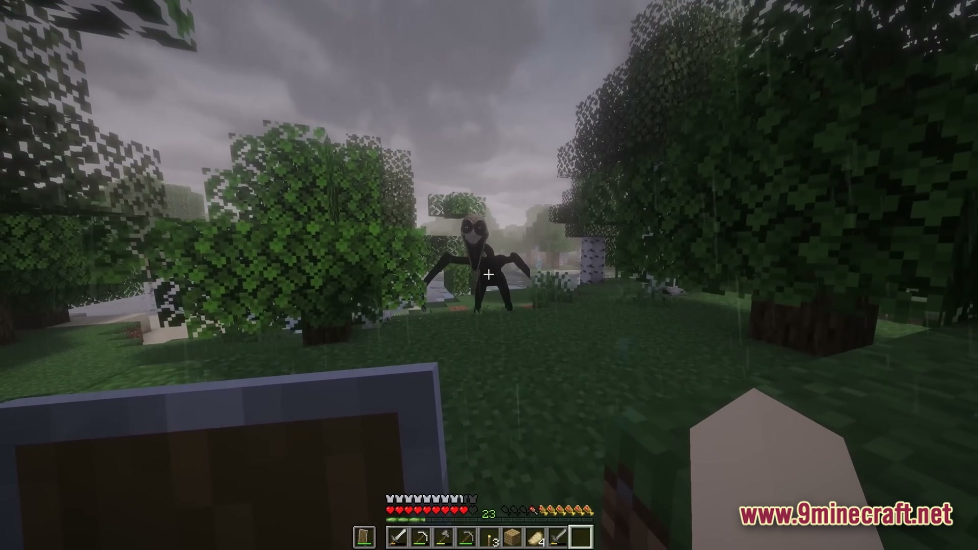 The Stalker Recreation Modpack (1.20.1) – Survive Craft Guns Hunt Monsters 6 A tall, dark creature with a pale face stands in a rainy forest during gameplay