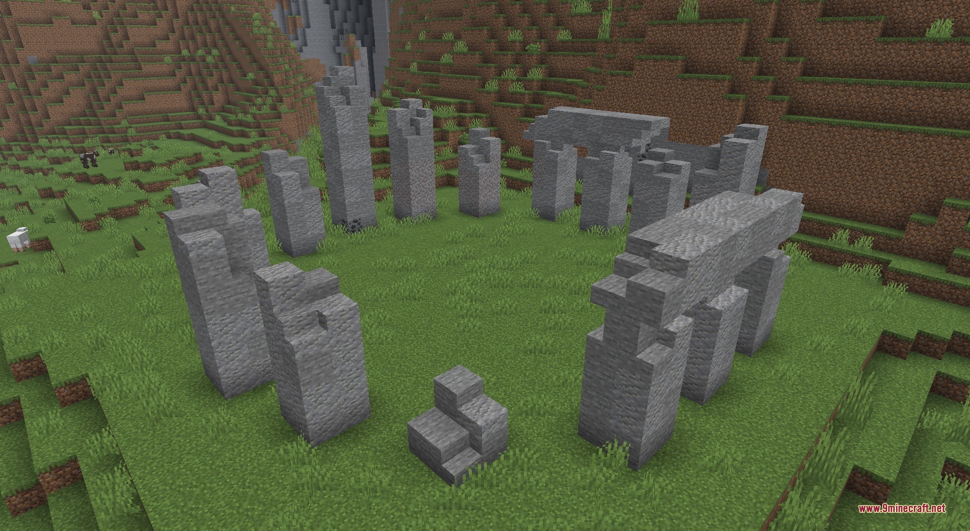 Ancient stone pillars arranged in a circle in a grassy plains biome
