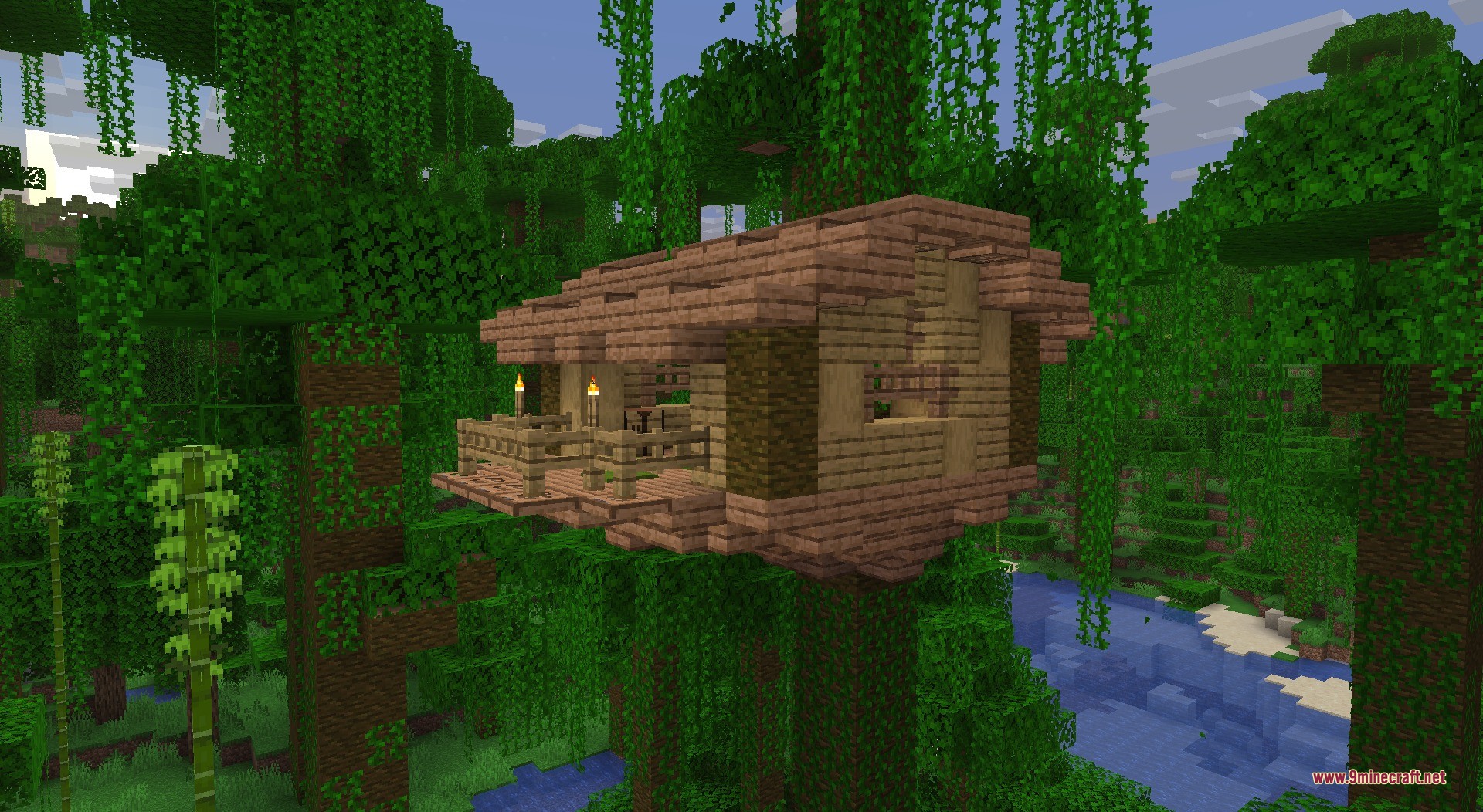 A wooden jungle treehouse overlooking a river in a dense jungle biome