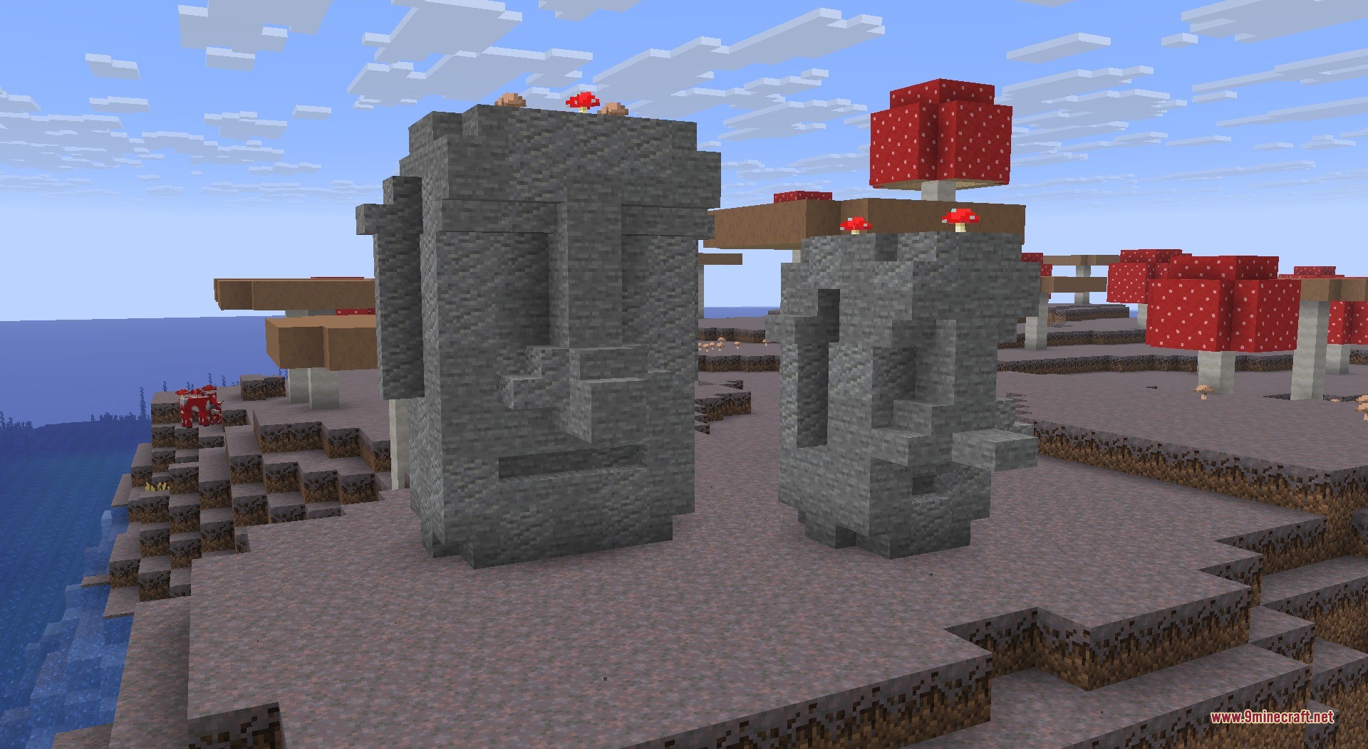 Two stone moai statues standing on a rare mushroom island biome
