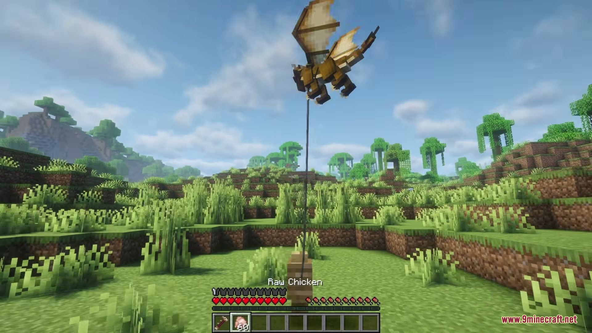 Tiny Dragons Reforged Mod (1.21.1, 1.20.1) – Hatch And Command Fire-Breathing 12 A tiny dragon flying while attached to a wooden fence post with a lead