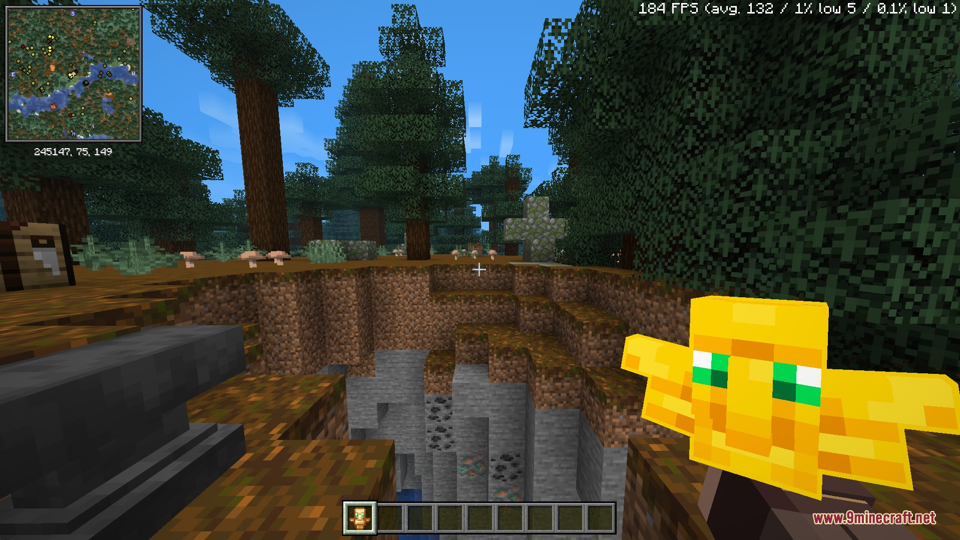 Totem &Amp; Stuff Resource Pack (1.21.11) – Action Inspired See-Through Totems 3 A player holds a custom translucent totem model while standing near a ravine