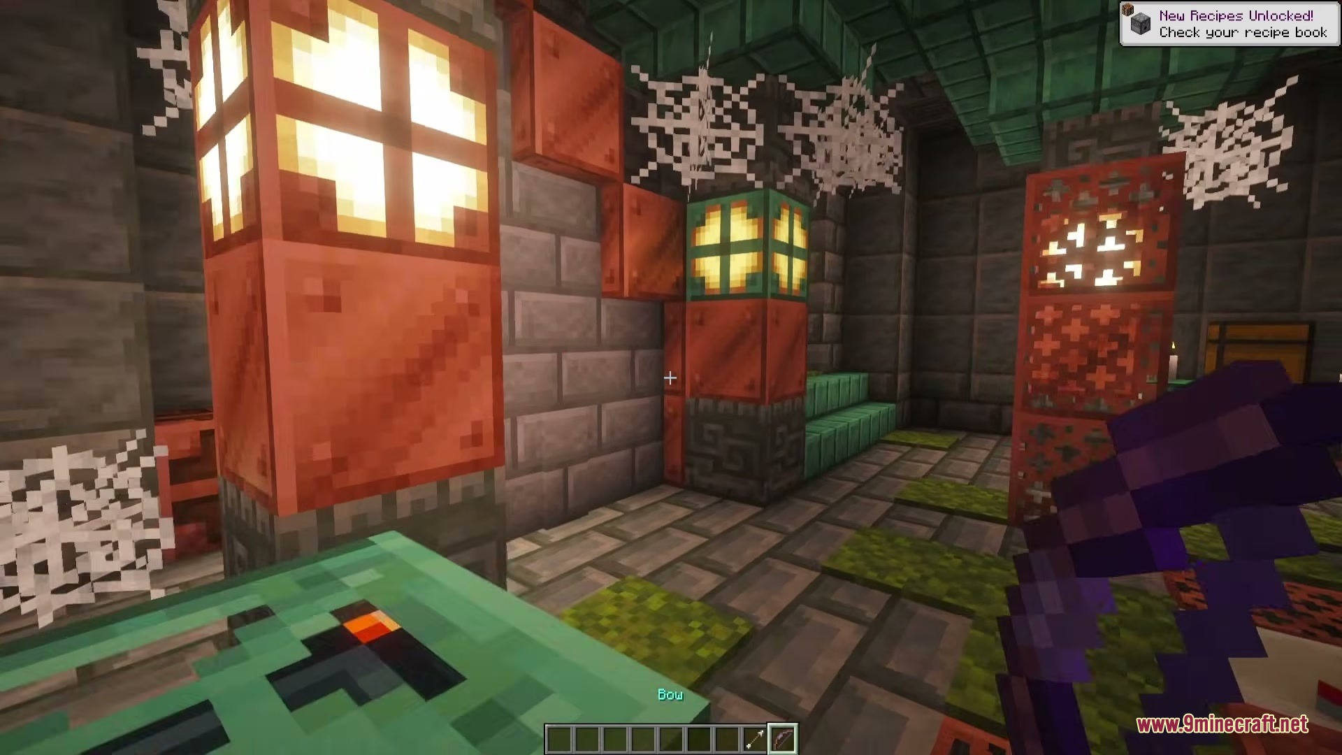 A player explores a trial chamber filled with copper bulbs and cobwebs