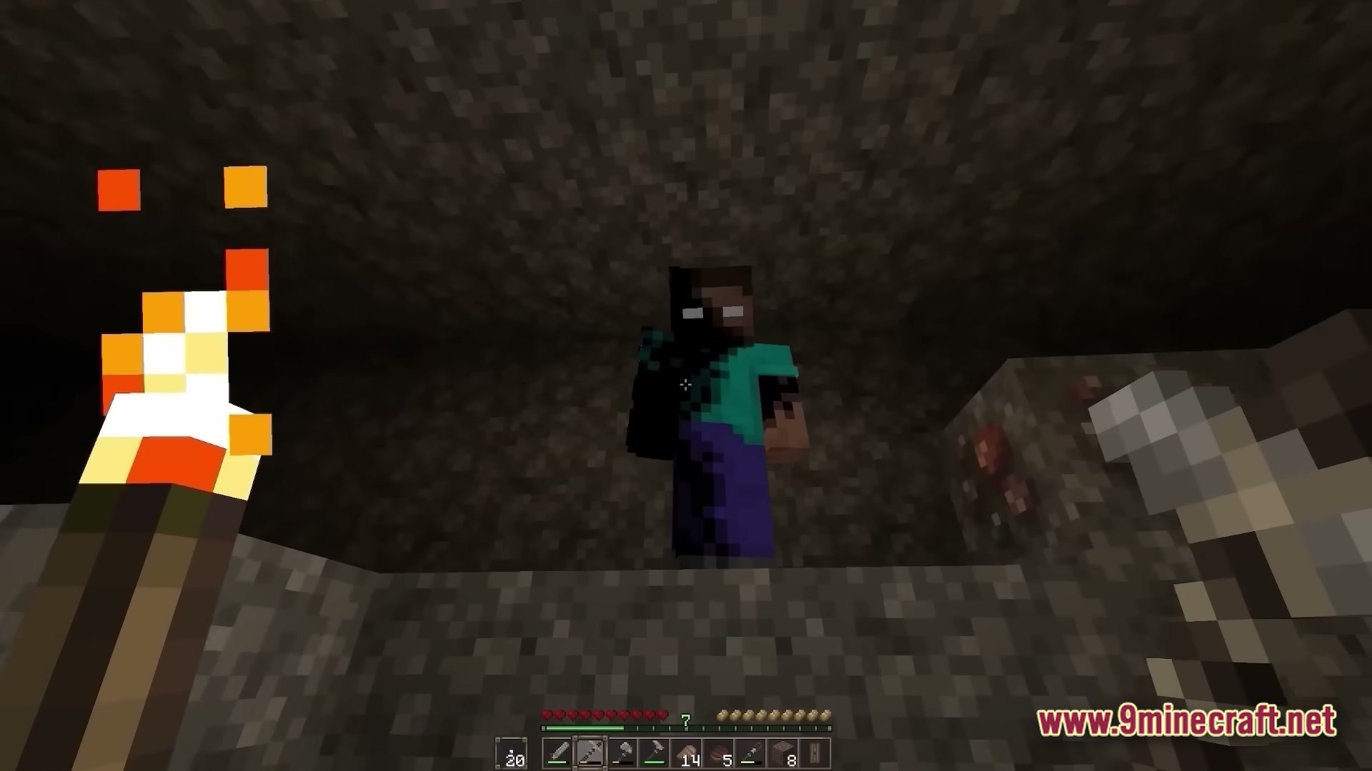 True Horror Modpack (1.20.1) – Survive Terrifying Monsters 7 A player encounters a shadowy herobrine figure while mining in a dark underground stone cave
