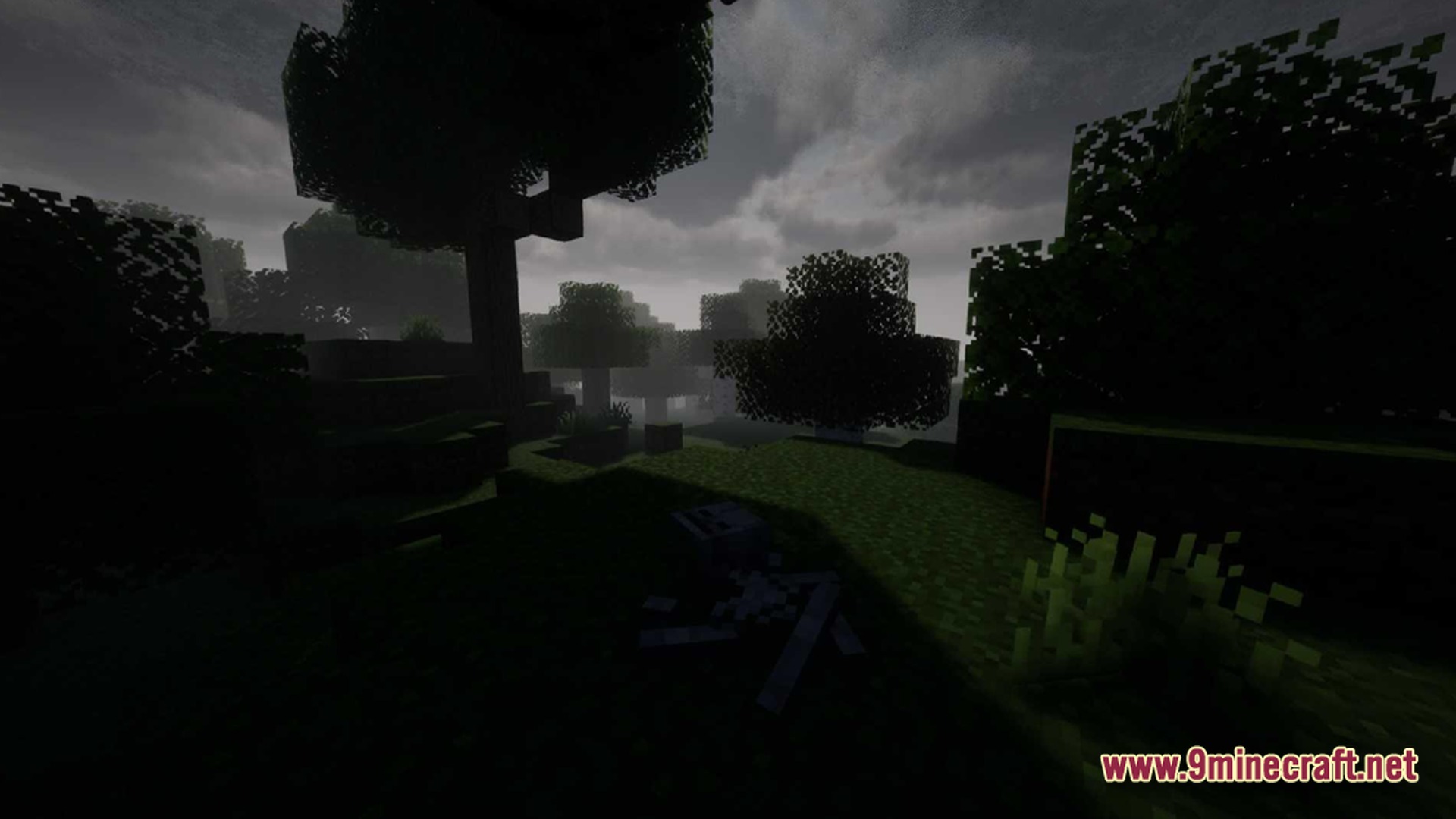 True Horror Modpack (1.20.1) – Survive Terrifying Monsters 9 A dark forest landscape under a cloudy sky featuring a skeleton remains on the grass