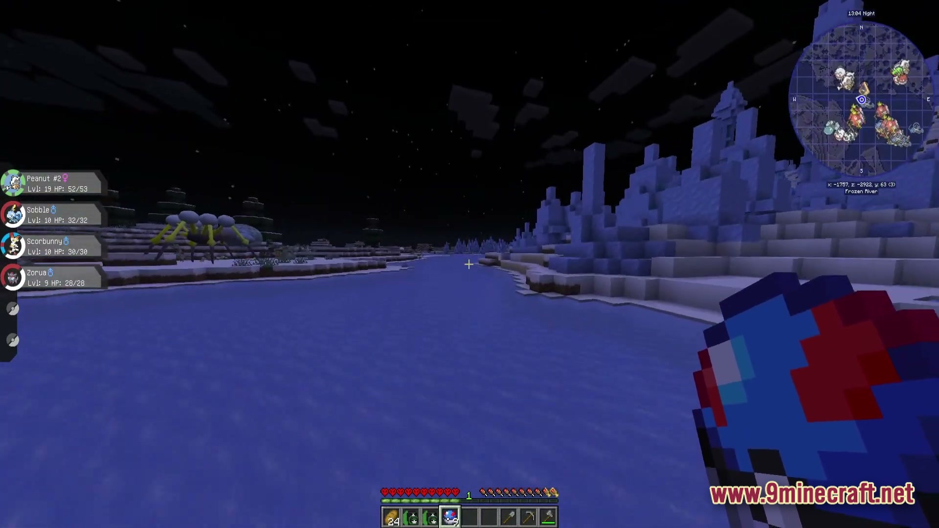 Ultra Hardcore Renewed Modpack (1.20.4) – Survive On One Single Life 4 A player holds a great ball while exploring a frozen river biome at night with pokémon