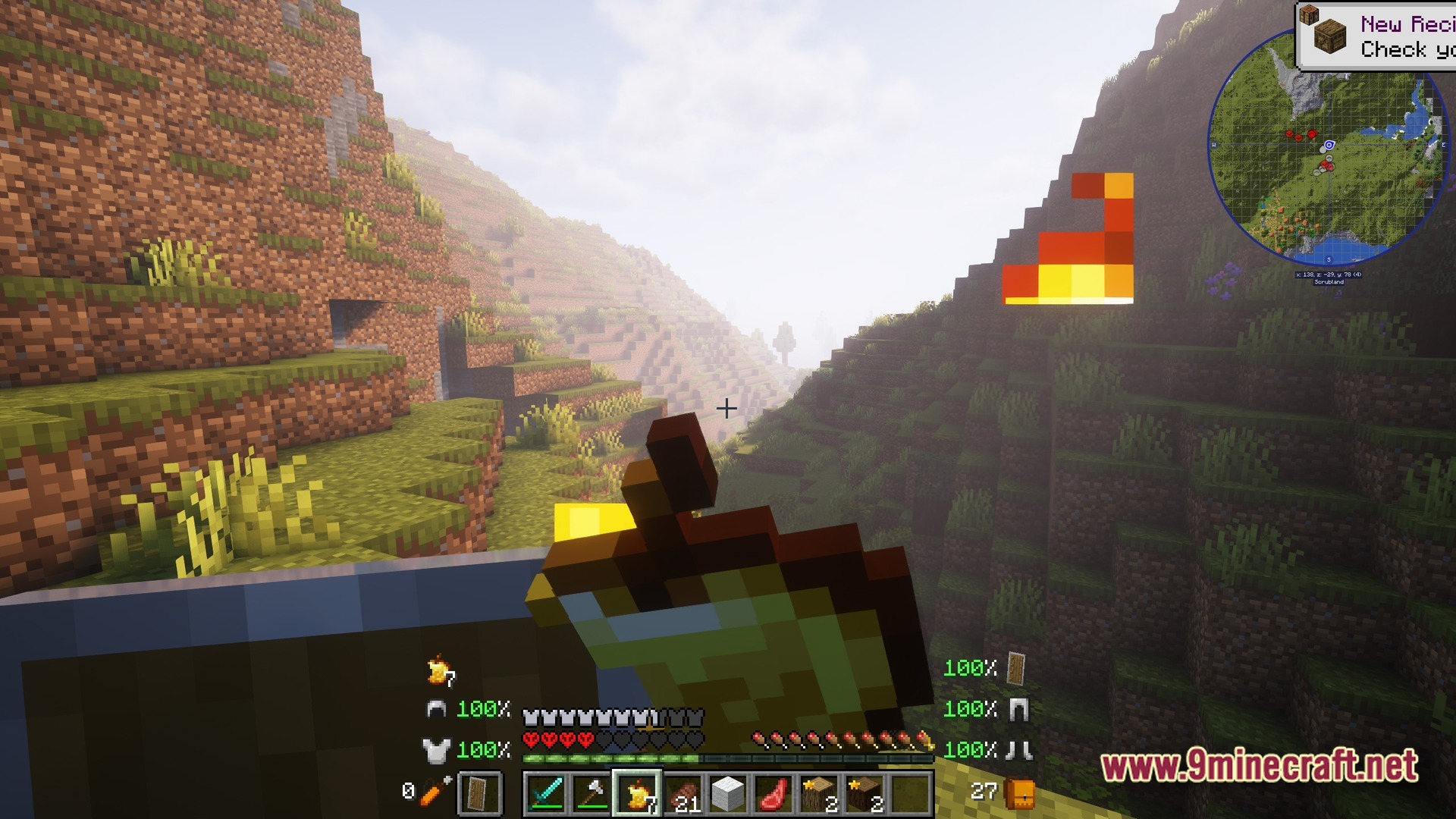 Ultra Hardcore Renewed Modpack (1.20.4) – Survive On One Single Life 9 A player holds a golden apple while overlooking a mountainous valley with a custom hud displayed