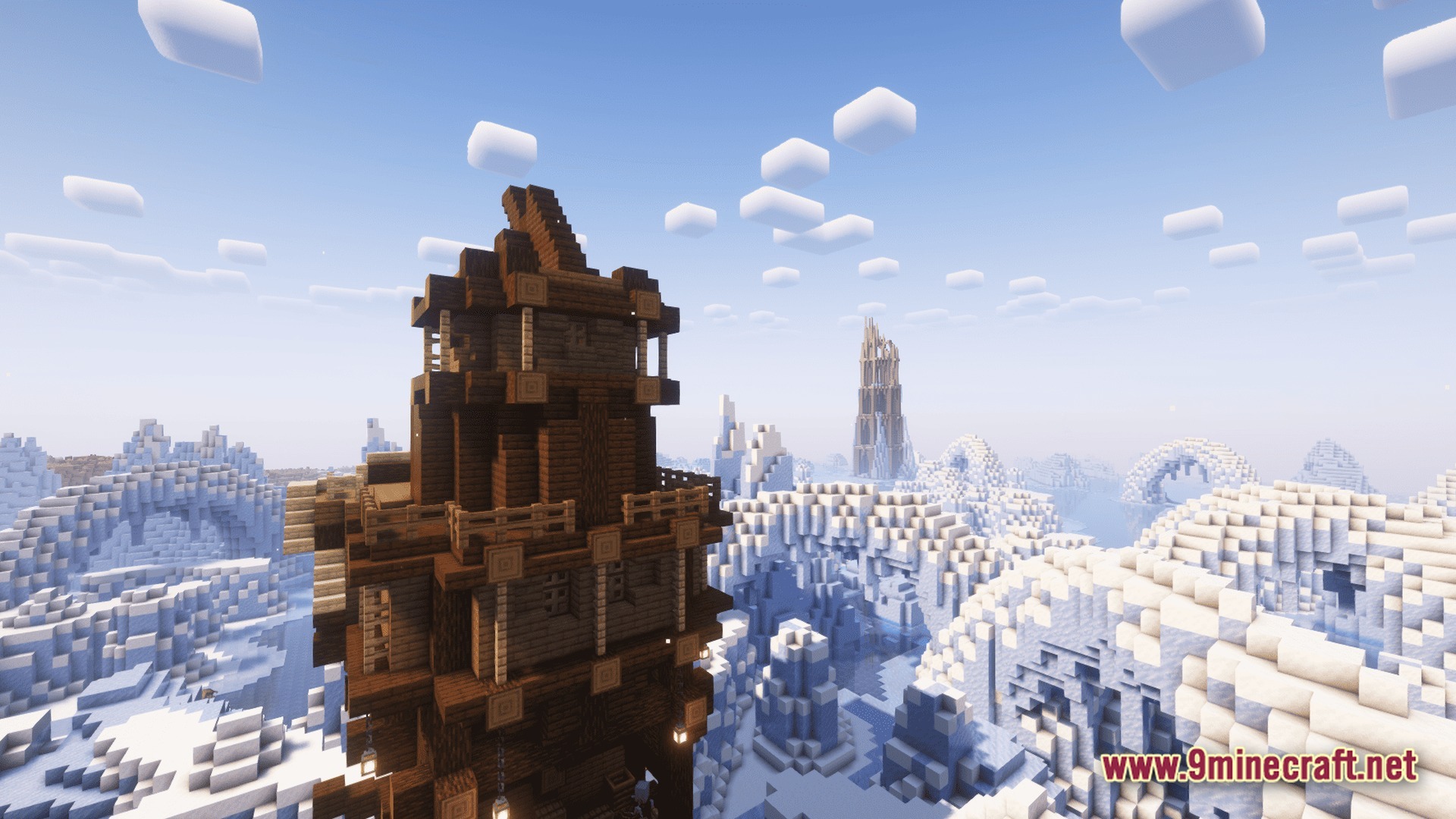 A wooden tower overlooks a vast frozen tundra biome filled with ice spikes and snow