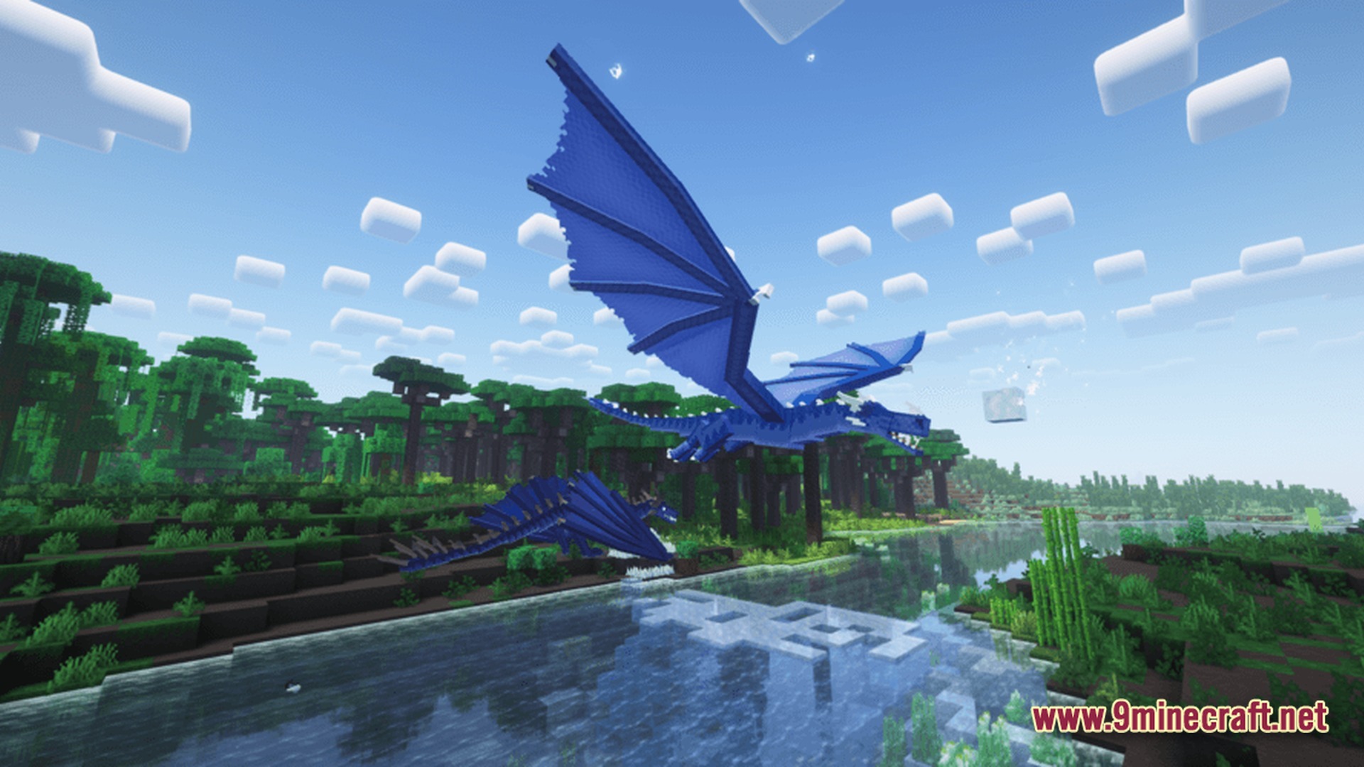 Two blue ice dragons fly over a lush jungle river under a clear blue sky