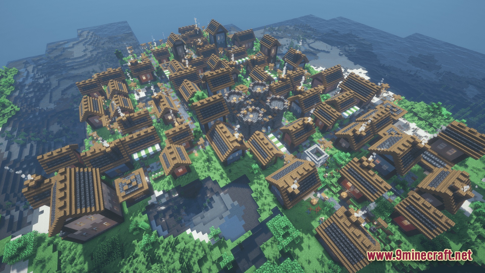 An aerial view of a densely populated medieval village with wooden houses and a stone castle