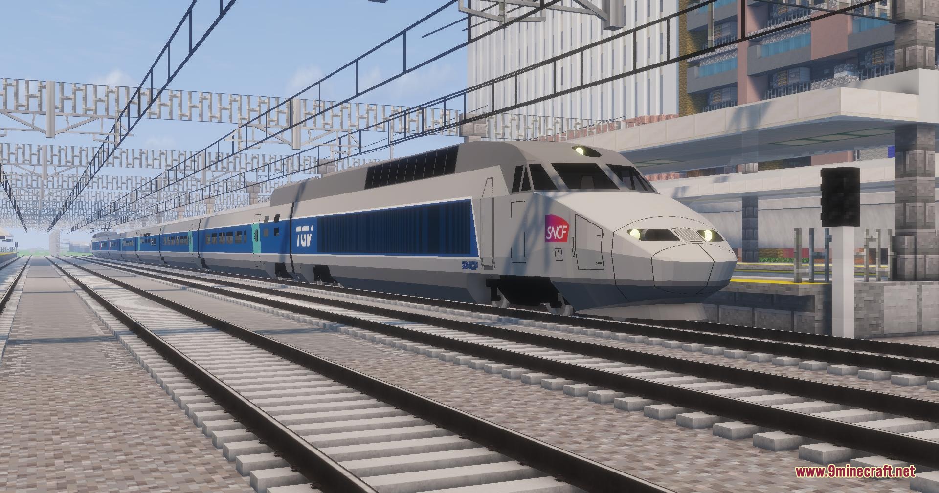 Velocity Rail Streamline Resource Pack (1.20.1) – Iconic French High-Speed 2 A silver and blue french high speed train traveling on minecraft tracks