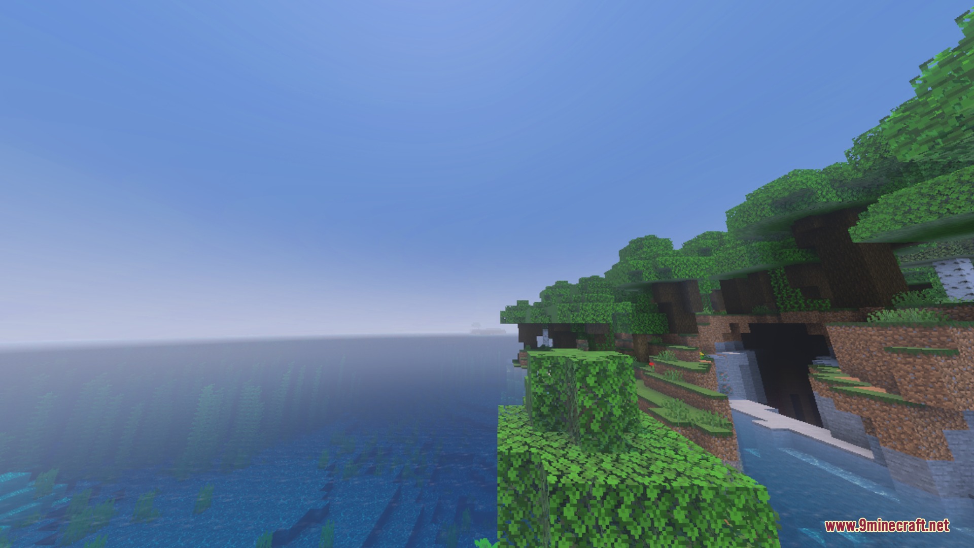 Clear ocean water and distant hills visible without thick fog in minecraft