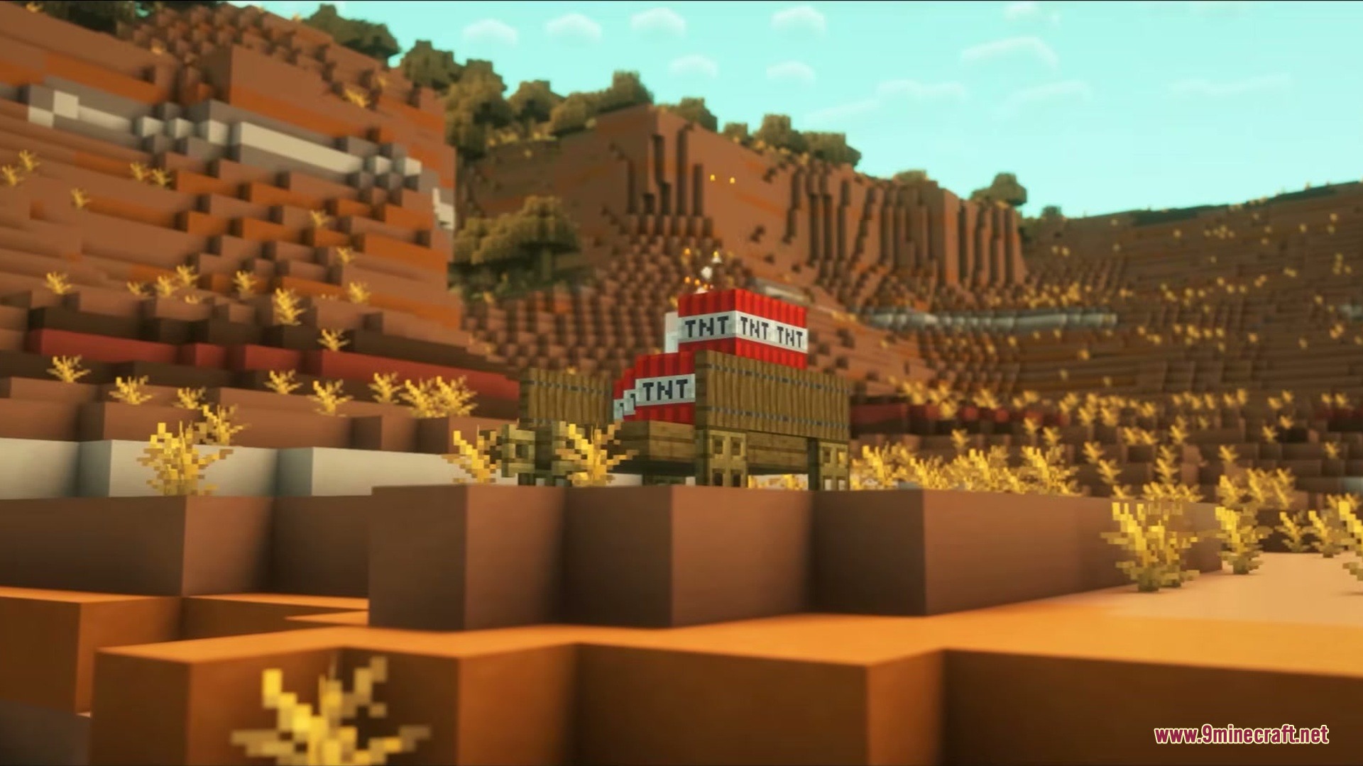 Wild West Structures Mod (1.21.8, 1.20.1) – Turn Dry Badlands Into Lively 9 A wooden wagon carrying tnt blocks parked on a mesa biome hill
