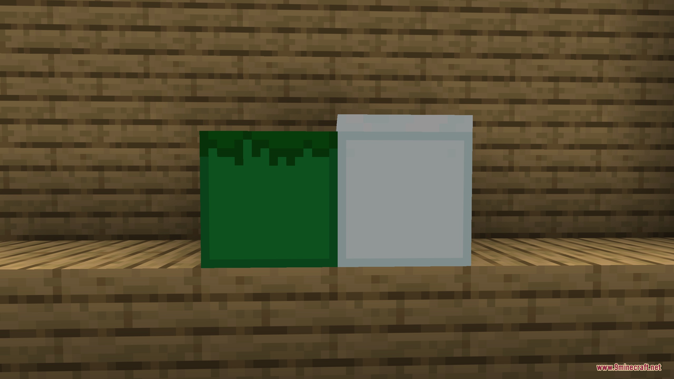 Angular Essence Resource Pack (26.2, 1.20.1) – Clean Low Poly Geometric World 8 Low poly green and grey blocks placed on a wooden surface