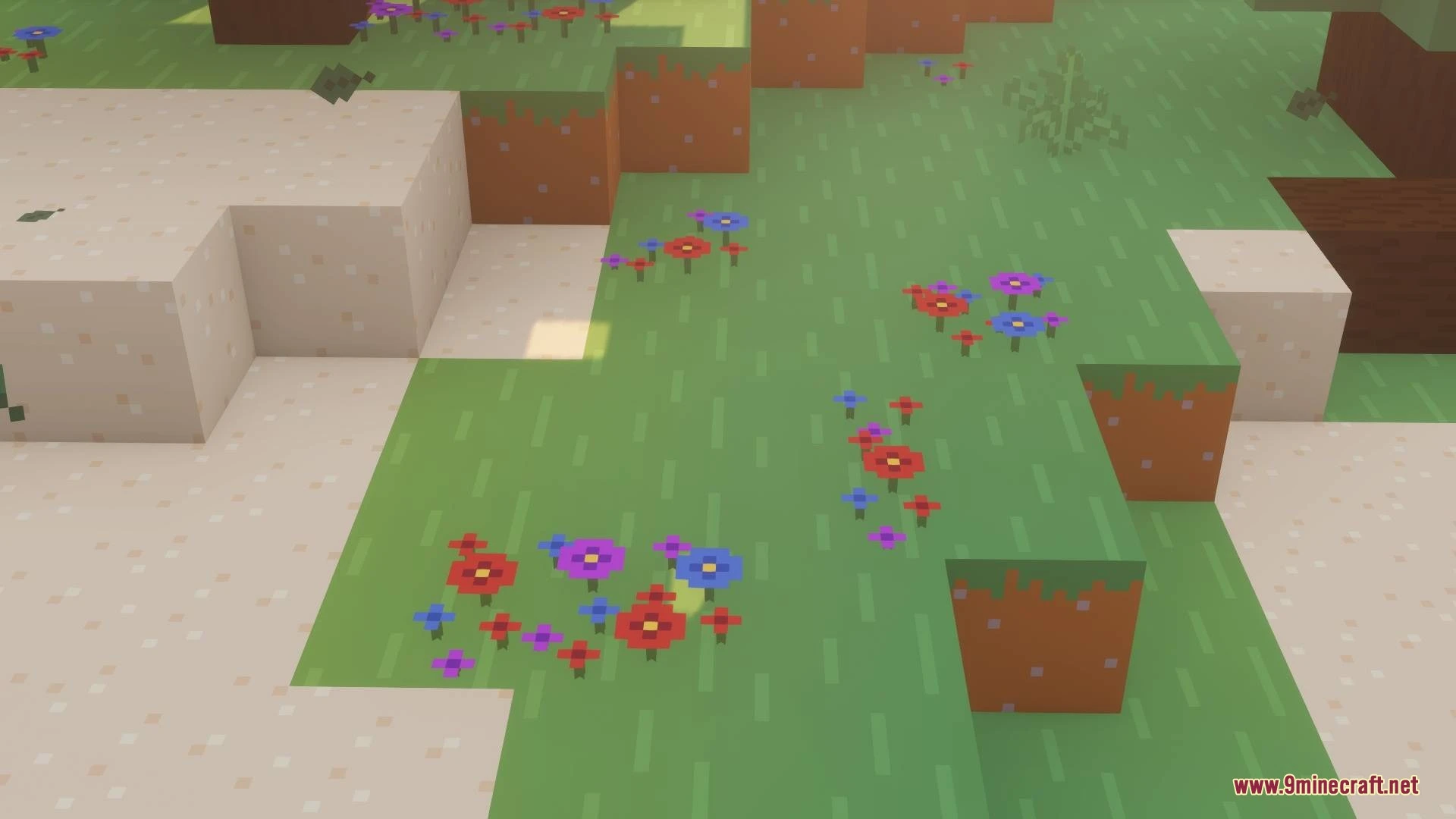 Simplified colorful flowers growing on flat green grass blocks in a blocky world