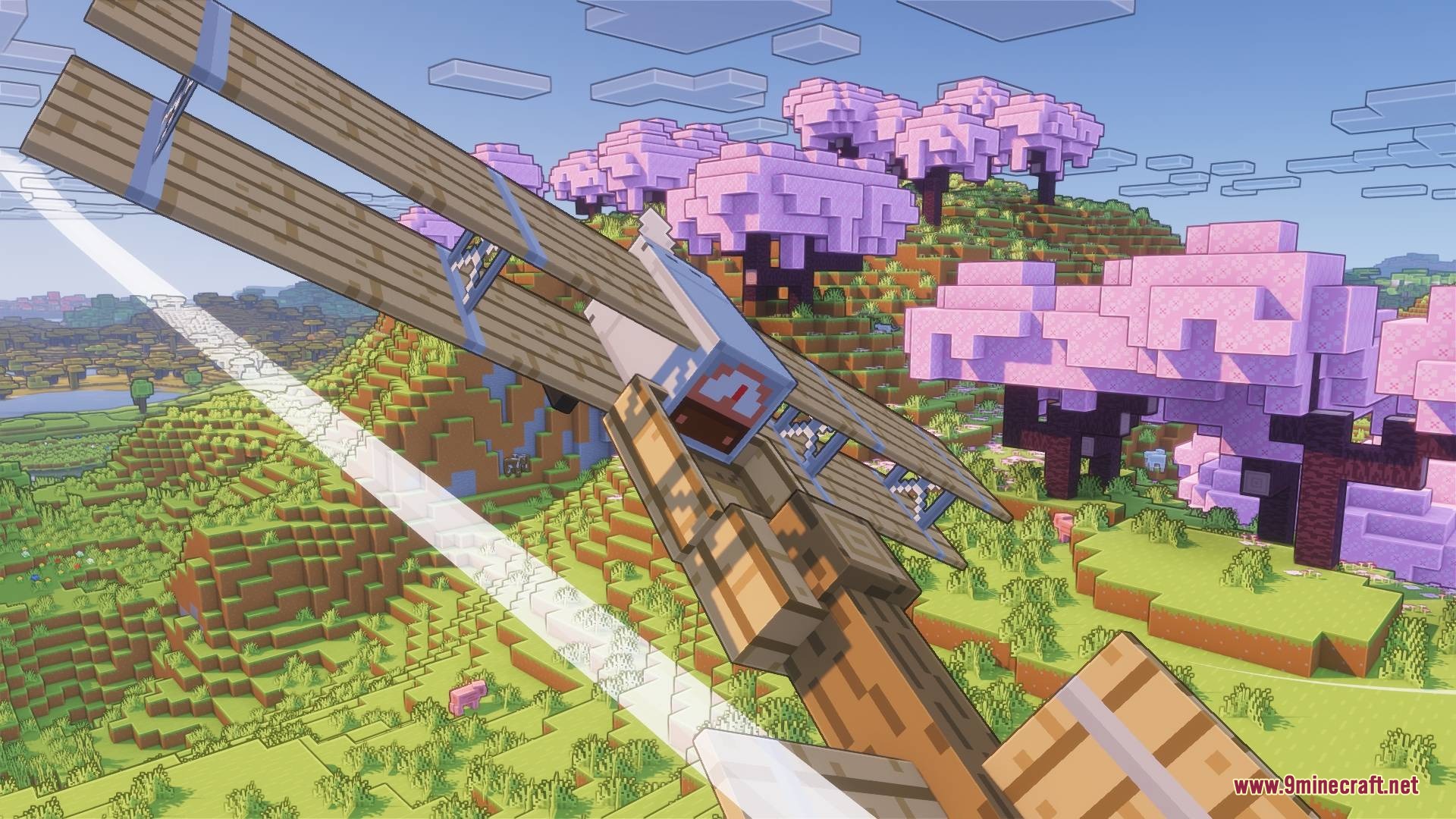 A player flies a wooden biplane over a vibrant pink cherry blossom forest biome