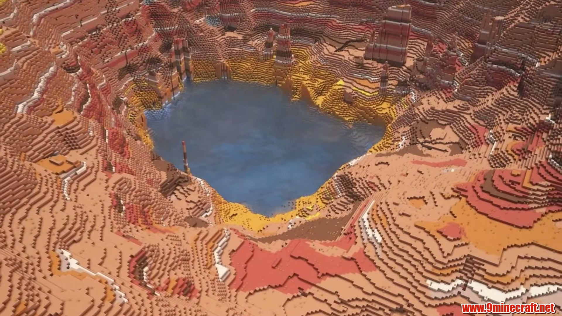 Best Seeds For Minecraft (26.2, 1.21.11) Part 14 – Java/Bedrock Edition 7 Second landscape view of badlands crater reservoir