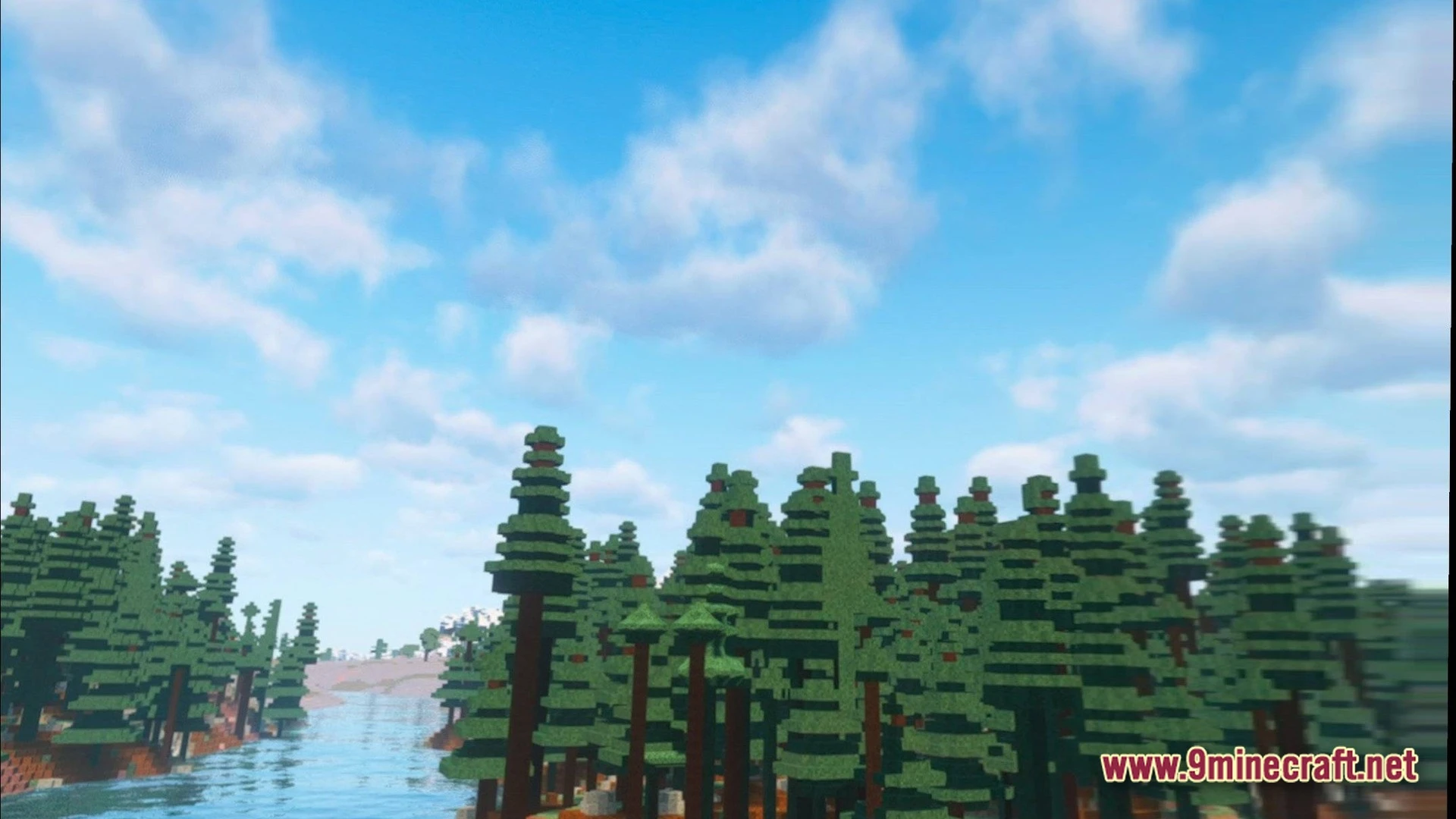 Cubic Horizon Immersion Modpack (1.20.1) – Play Minecraft In Virtual Reality 8 Dense pine forest bordering a river under a bright blue sky with realistic clouds