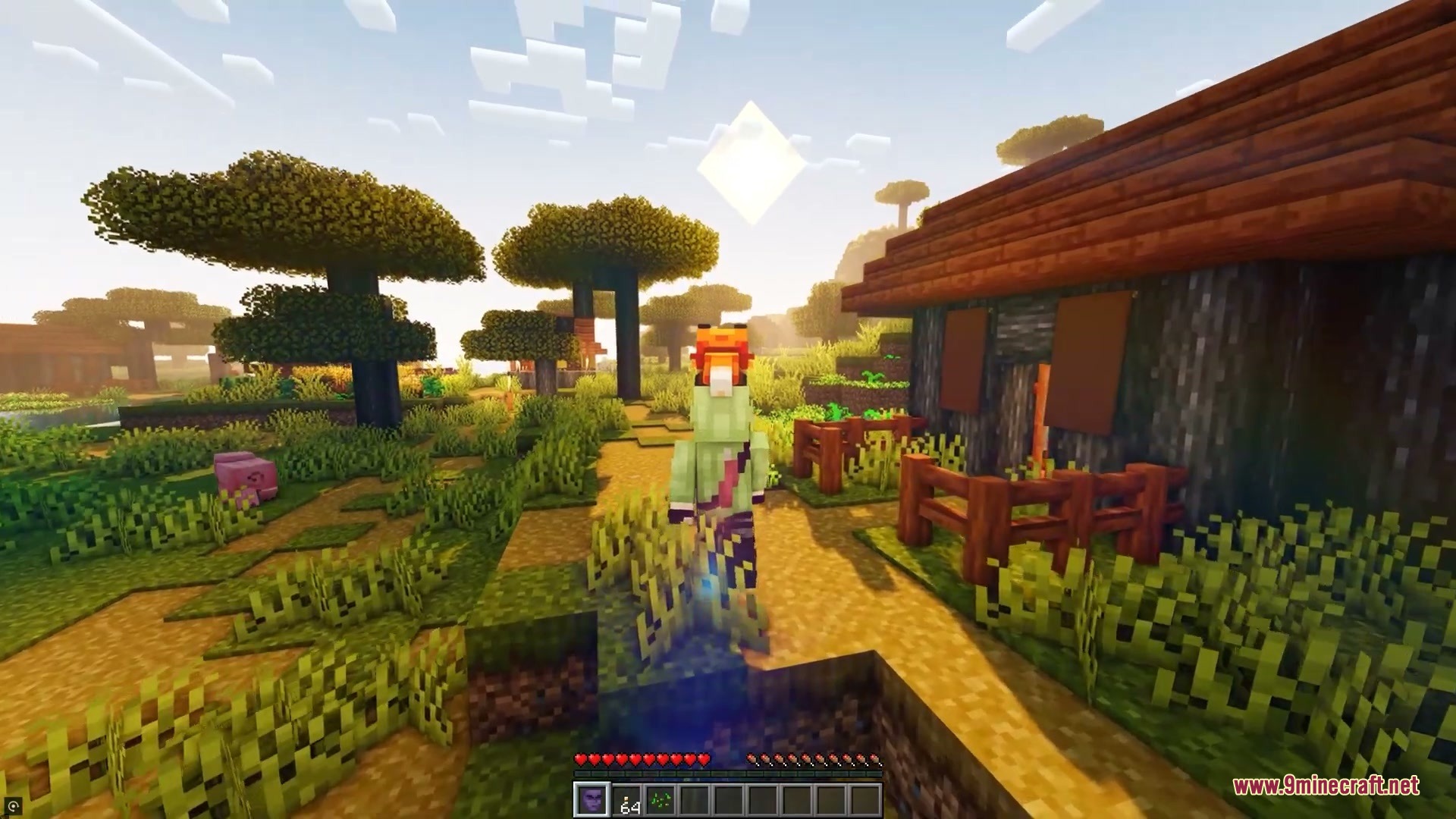 Minecraft player wearing a fox disguise exploring a savanna village during a sunset