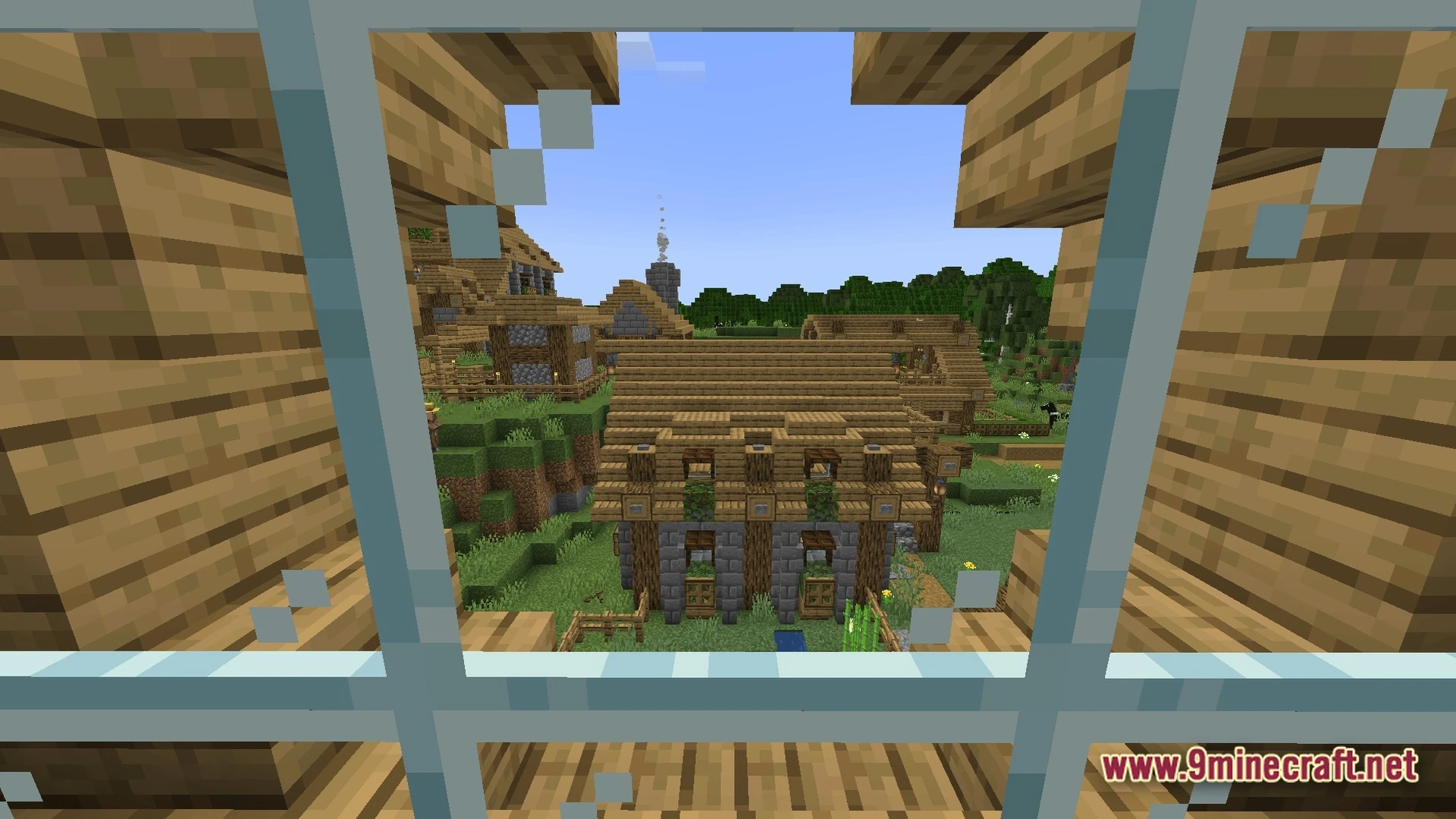 Frontier Combat Engine Modpack (1.20.1) – Guns Vehicles And Hardcore Survival 6 A view through a glass window overlooking a village with wooden and stone buildings