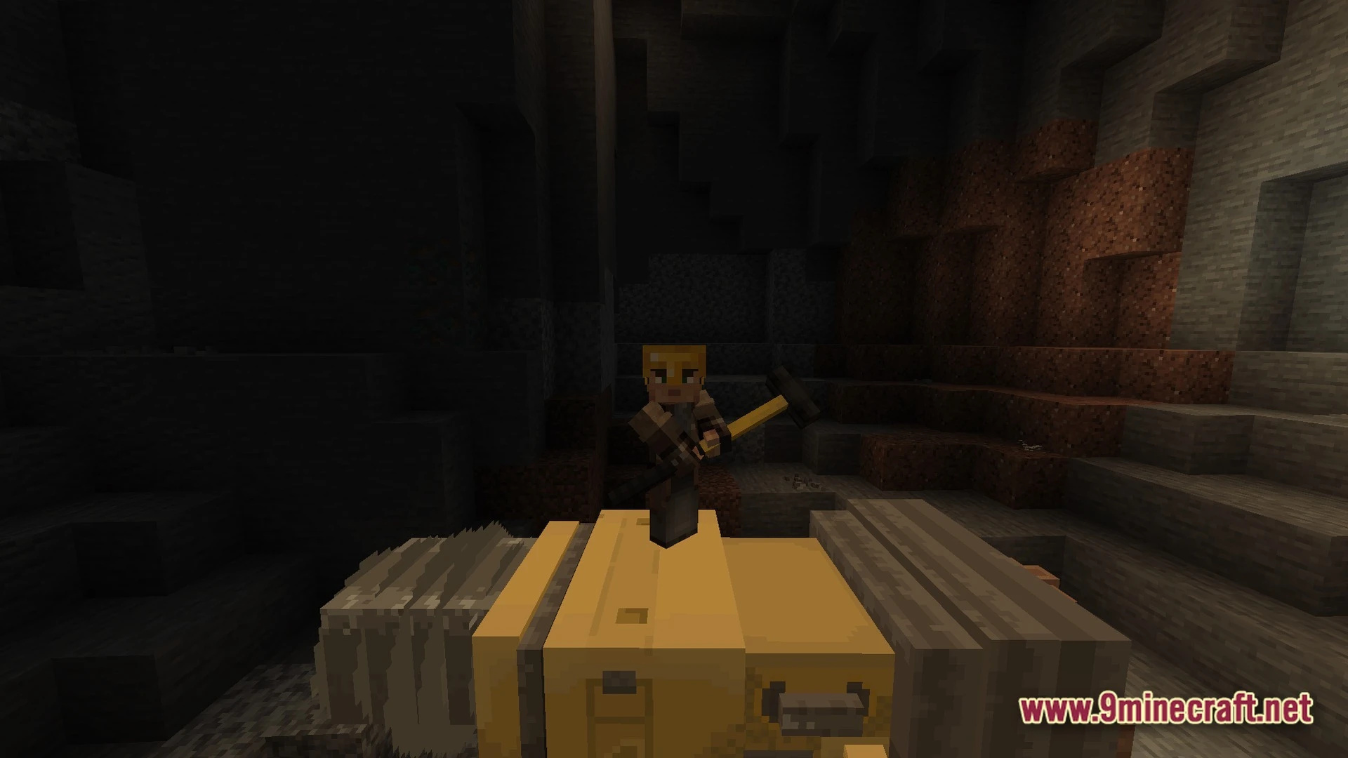 Frontier Combat Engine Modpack (1.20.1) – Guns Vehicles And Hardcore Survival 7 A player character wearing a helmet and holding a hammer stands atop a yellow mining machine