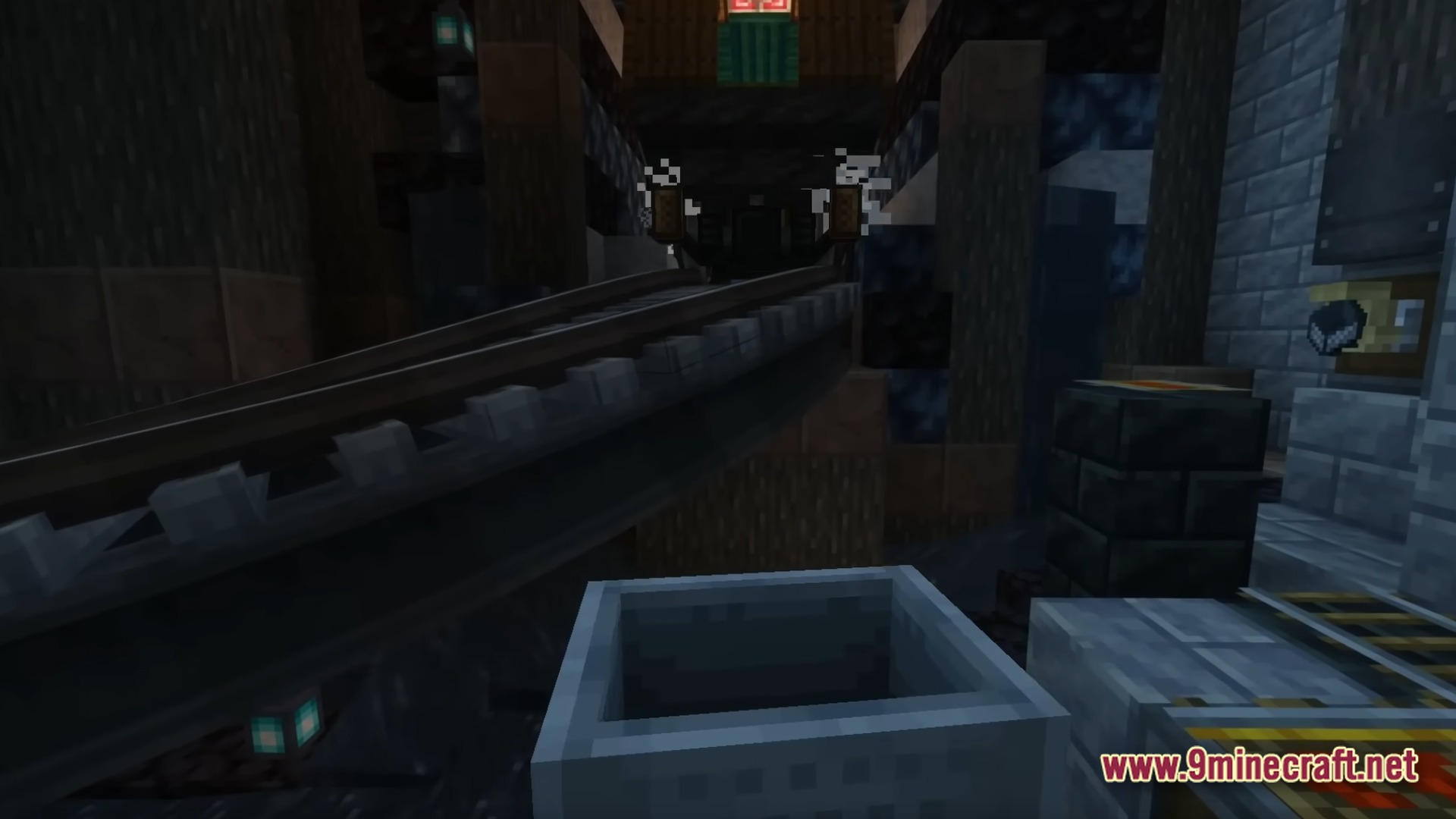Infernal Kinetic Dread Modpack (1.21.1) – Build Machines Survive Horrors 11 A first-person view from a minecart ascending a steep industrial track inside a dark stone structure