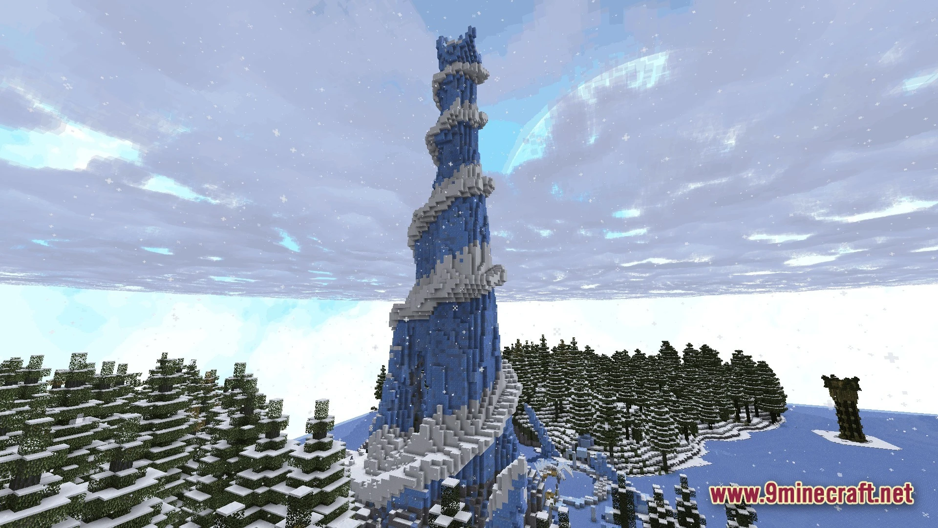 Mystic Realm Awakened Modpack (1.20.1) – Magic Mystery And Hard Survival 11 A tall blue and white spiral tower stands within a snowy coniferous forest biome during snowfall