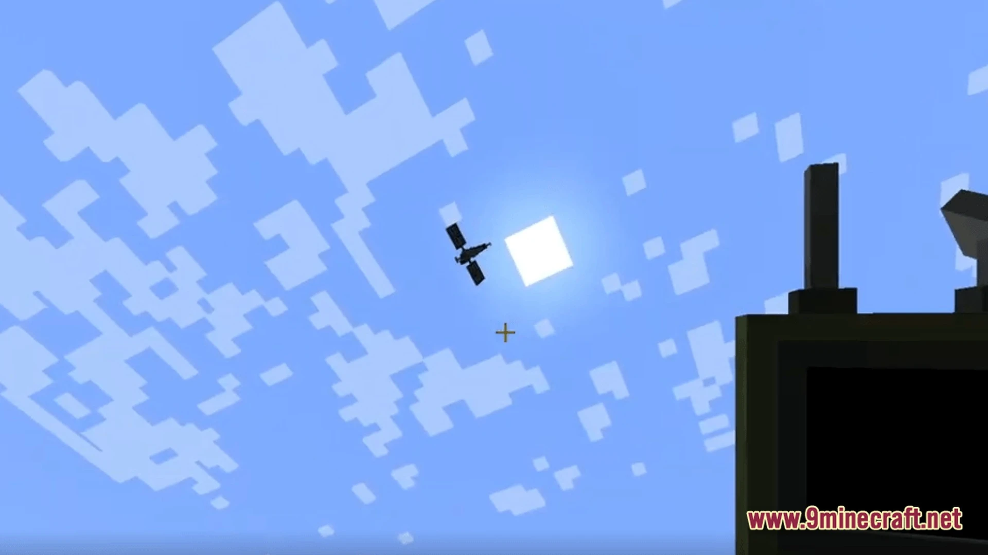 A satellite orbits in the blue sky near the sun above a blocky communication terminal