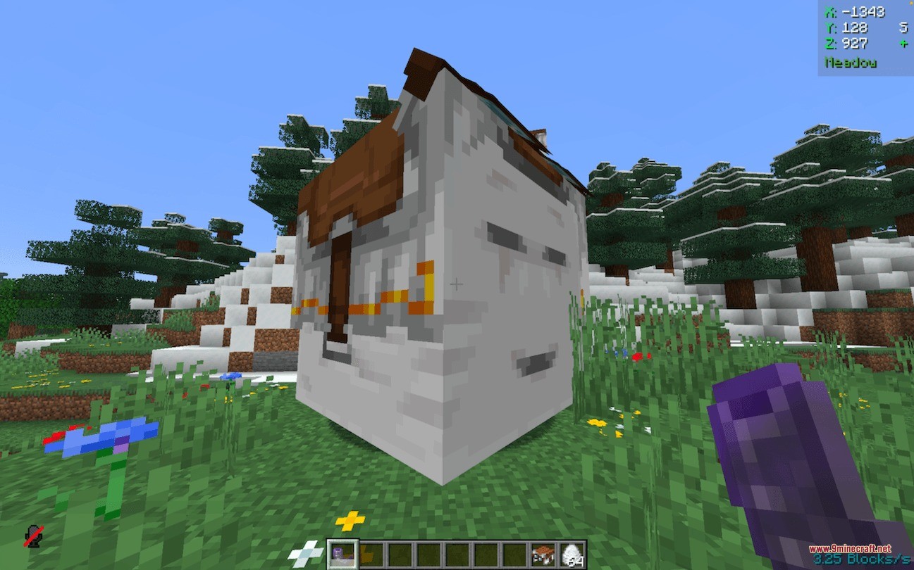 Close up of a small white ghast wearing a brown saddle