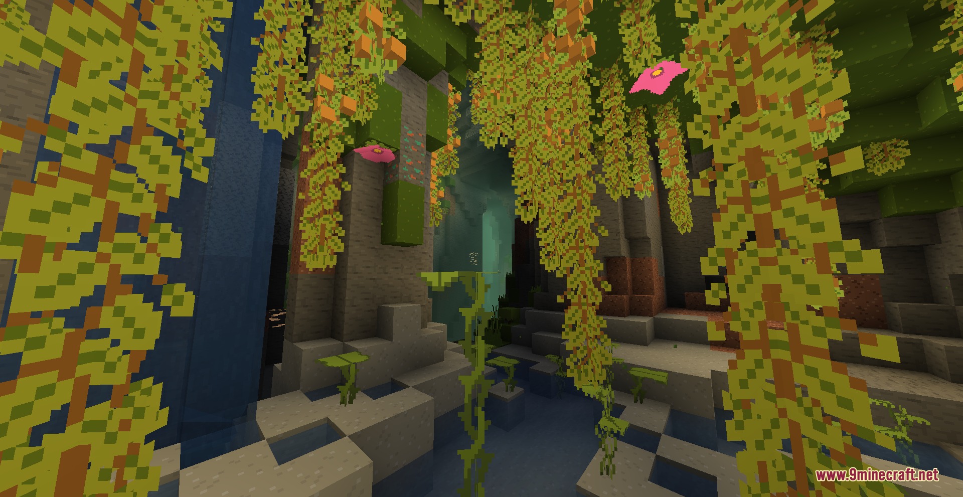 Lush cave biome with hanging yellow vines and pink flowers over water