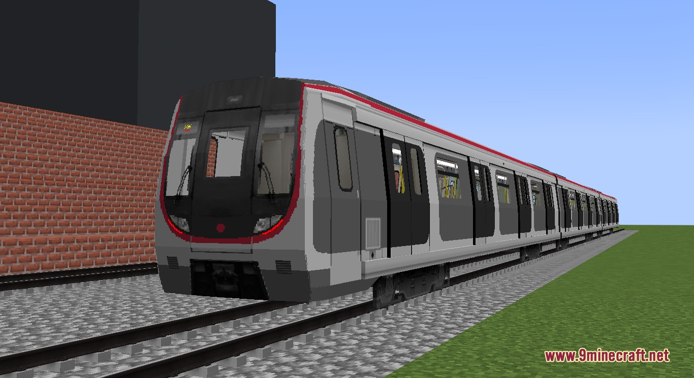 Rapid Transit Draft Resource Pack (1.20.1) – Realistic Metro Cars For City Rails 5 A long grey and red metro train on a gravel railway track