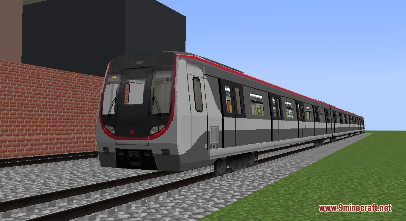 Rapid Transit Draft Resource Pack (1.20.1) – Realistic Metro Cars For City Rails 7 A long modern metro train with red accents on a gravel track