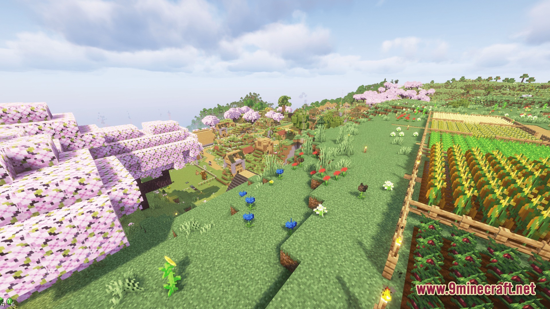 Sovereign Skies Quest Modpack (1.20.3) – Build Towns And Complete Quests 10 A village and agricultural fields situated among cherry blossom trees and rolling green hills