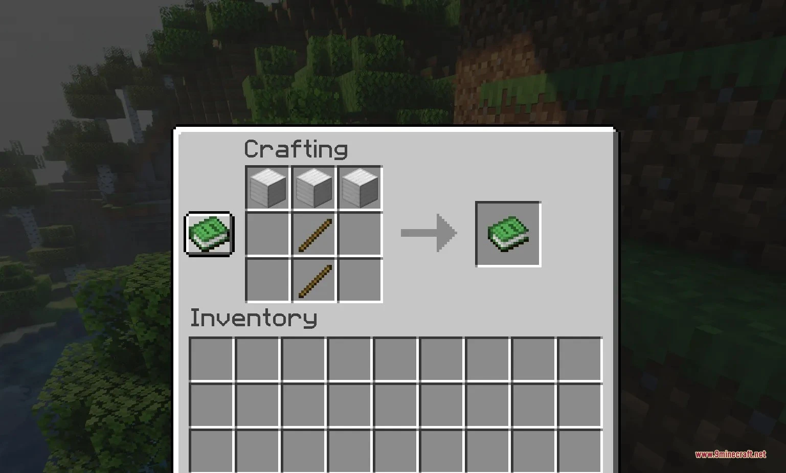 Crafting recipe for a guide book using iron blocks and wooden sticks