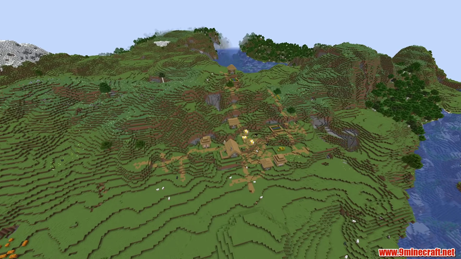 Top 10 Awesome New Seeds For Minecraft 26.2 – Java &Amp; Bedrock Edition 20 Coastal peninsula hillside village and snowy peaks - minecraft seed -2226996406319854239