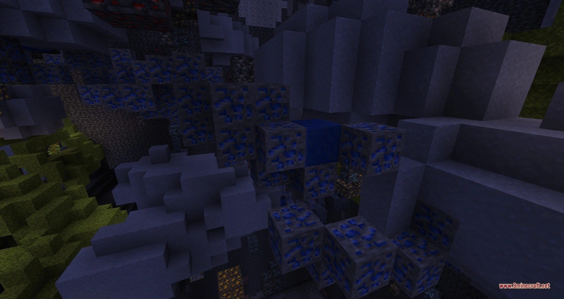 Large cluster of lapis lazuli ore blocks surrounding a solid lapis block