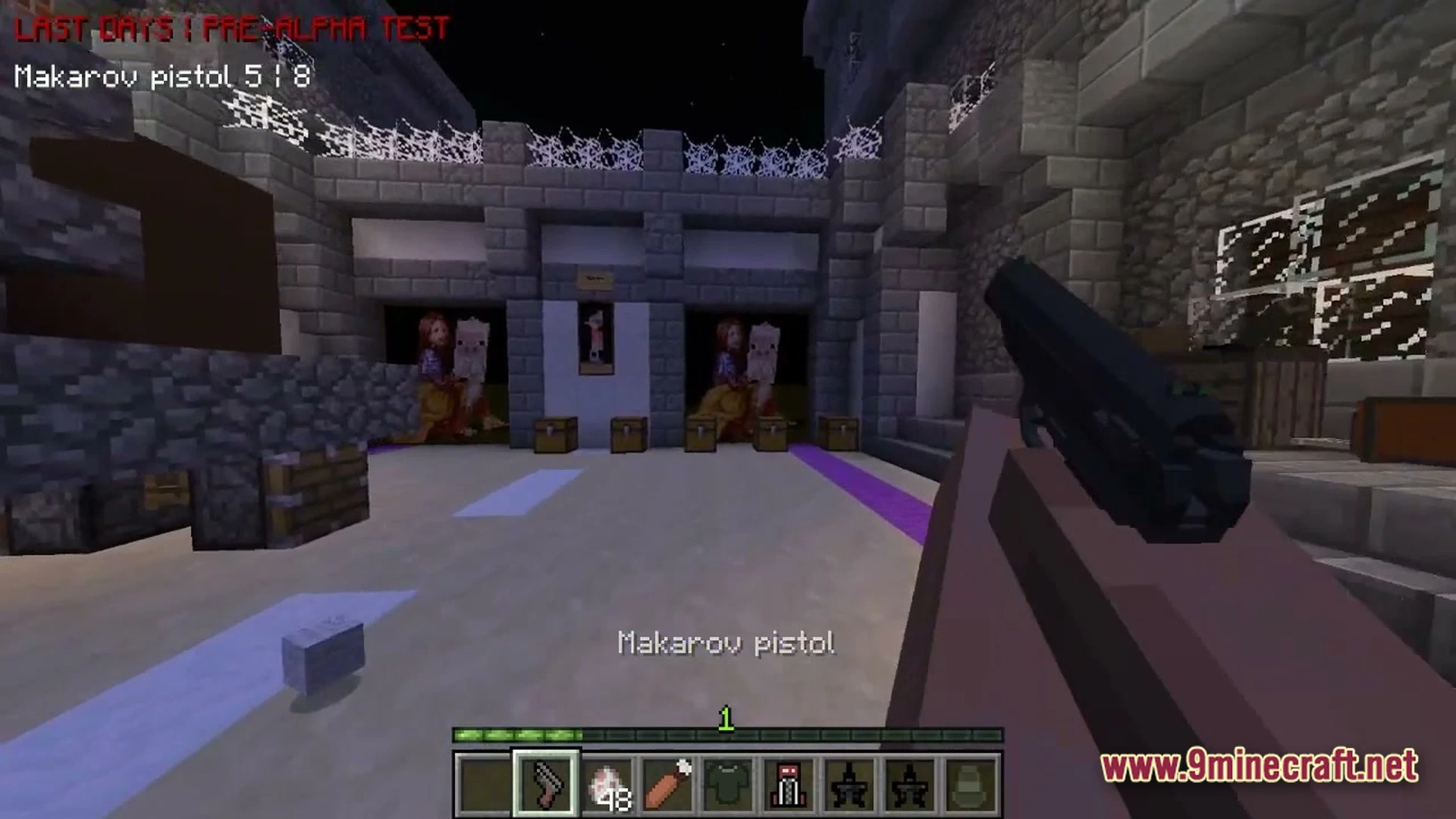 A player holds a makarov pistol in a stone courtyard with chests and paintings at night