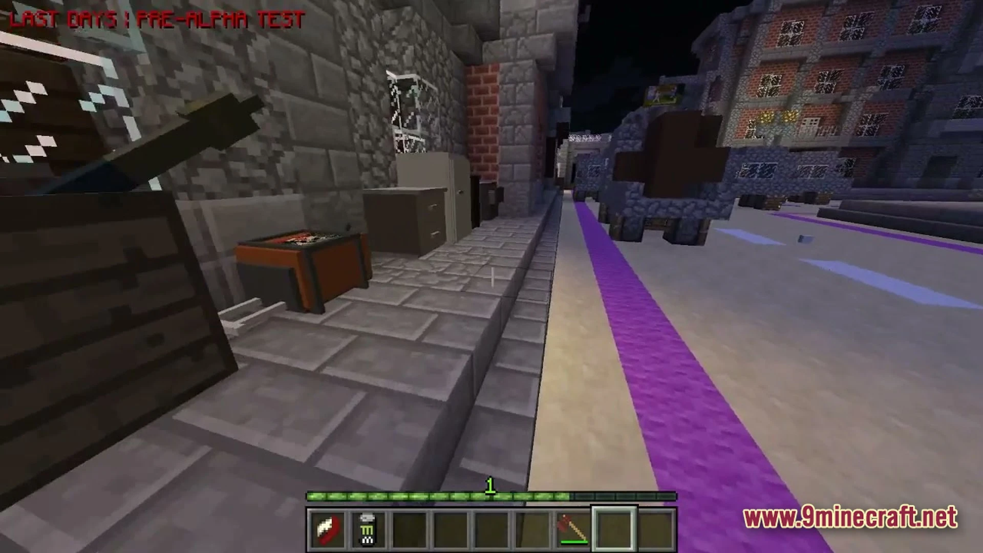 A first-person perspective of a character standing on a sidewalk in a post-apocalyptic city at night