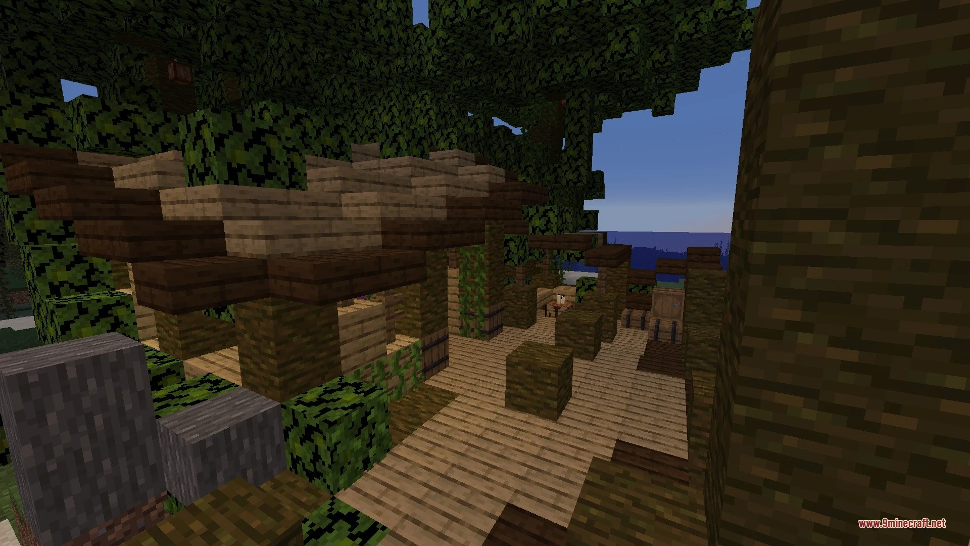 Detailed wooden structure with a layered roof built inside a dense forest