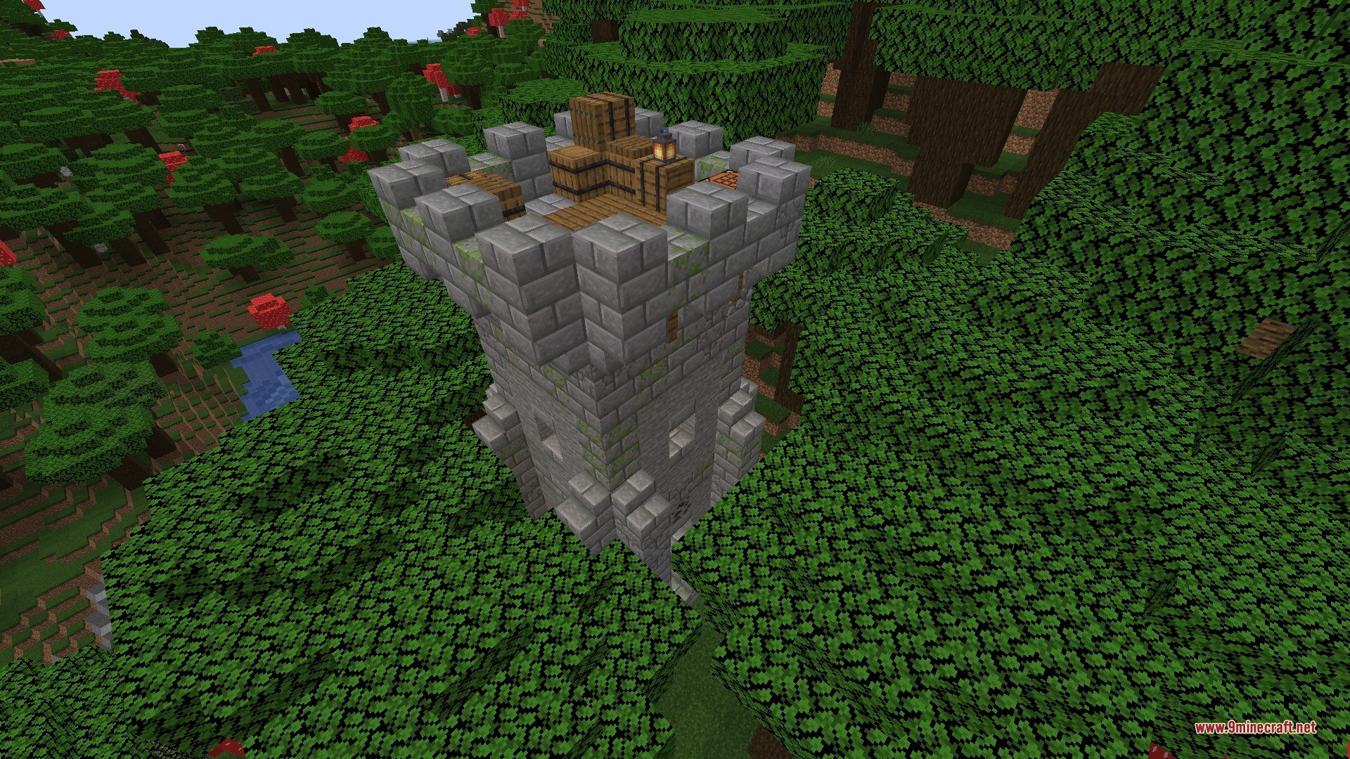 A small stone watchtower with barrels on top overlooking a dense forest