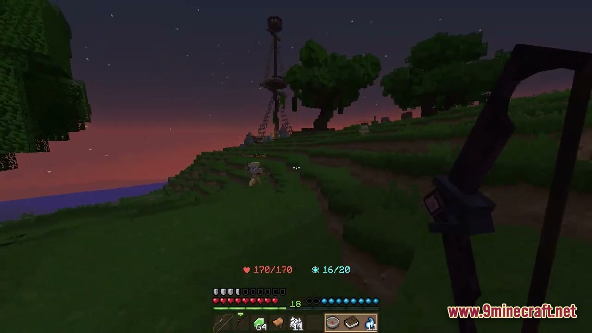 Wynnbound Essentials Modpack (1.21.4) – Essential Tools For Wynncraft 4 A player holds a bow while exploring a grassy landscape with custom structures at dusk