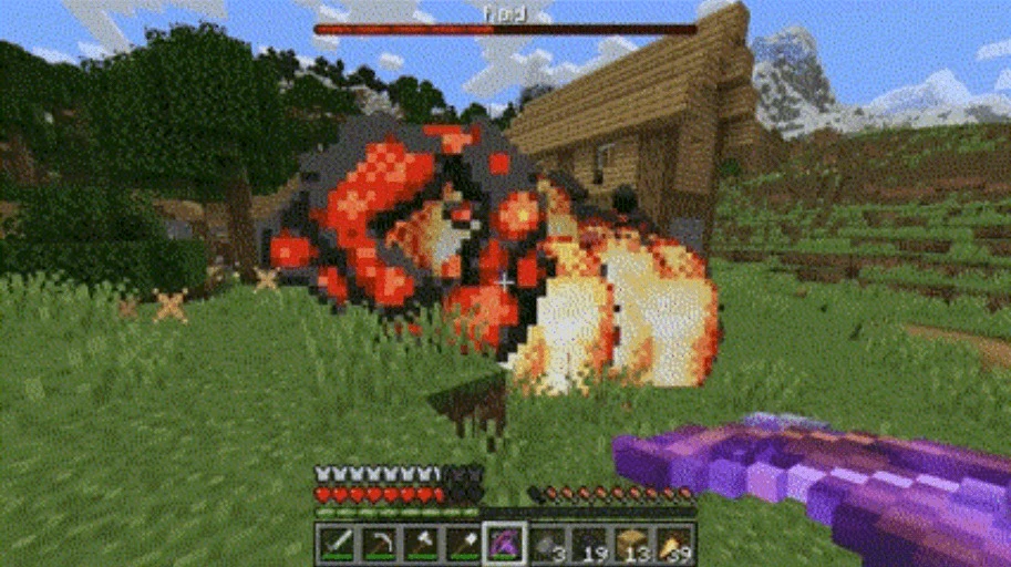 Minecraft player battling a giant fiery boss named fod in a village